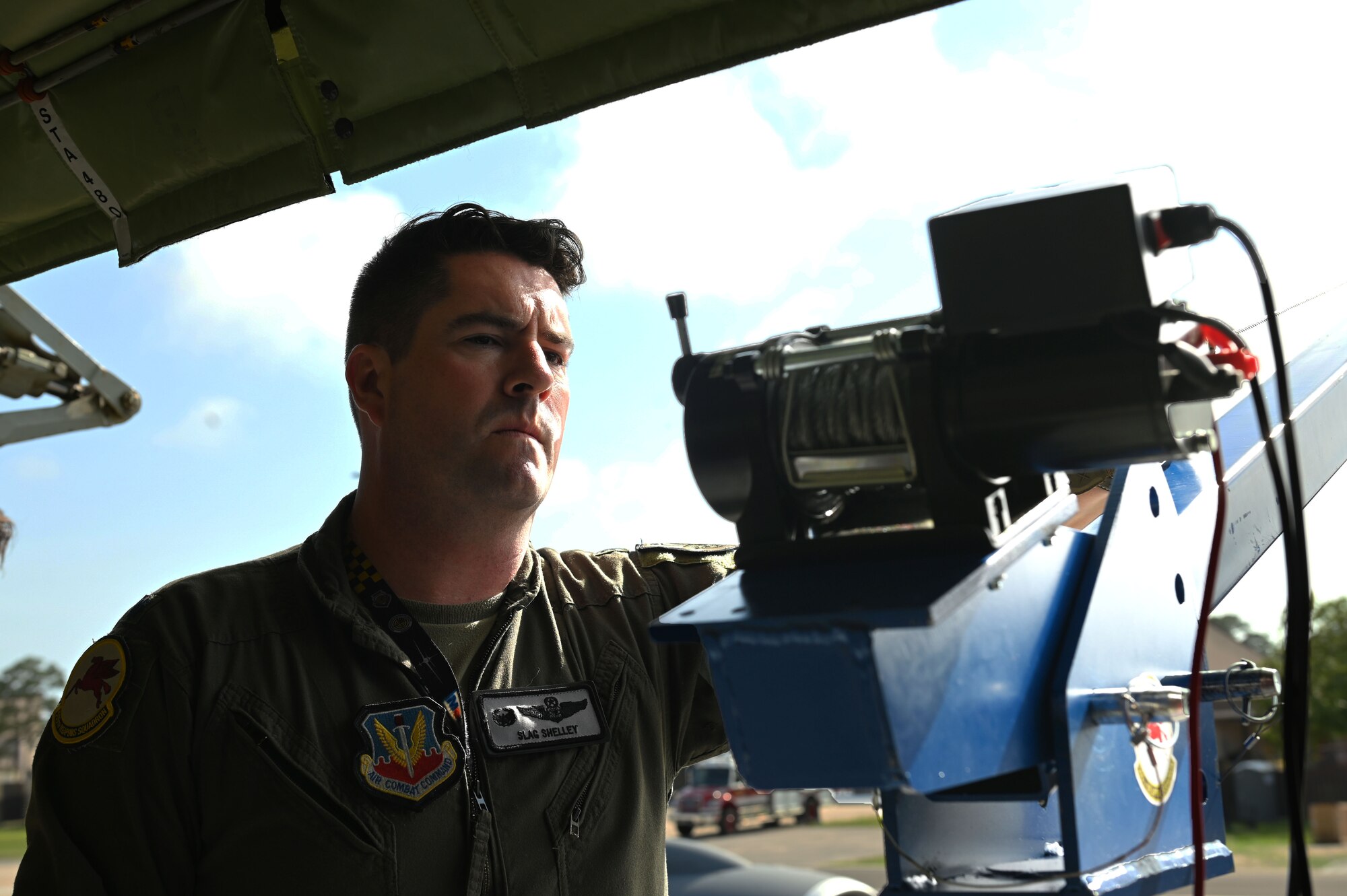 U.S. Air Force Lt. Col. Ian Shelley, 509th Weapons Squadron commander, prepares to operate the Pack and Transport Reloader (PATR) crane prototype at Hurlburt Field, Florida, May 6, 2023. The 509th WPS partnered with Fairchild Air Force Base’s innovation cell to create the crane with a goal of expanding the KC-135 Stratotanker’s ability to load and unload various types of cargo using the PATR crane prototype. (U.S. Air Force photo by Staff Sgt. Lawrence Sena)