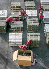 Sailors prepare ordnance for offloading aboard USS George H.W. Bush (CVN 77) in the Atlantic Ocean.