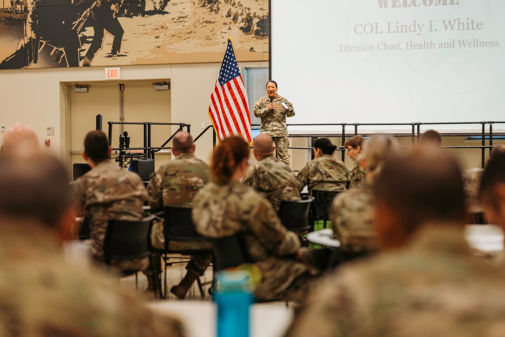 Col. Lindy I. White, divison chief, health and wellness, delivers opening remarks during the Oklahoma National Guard Health and Wellness Event at the Armed Forces Reserve Center, Norman, Okla., 09 May, 2023. The health and wellness event focused on the five pillars of health; physical, occupational, social, spiritual and financial wellness.  (Oklahoma National Guard photo by Master Sgt. Mireille Merilice-Roberts)