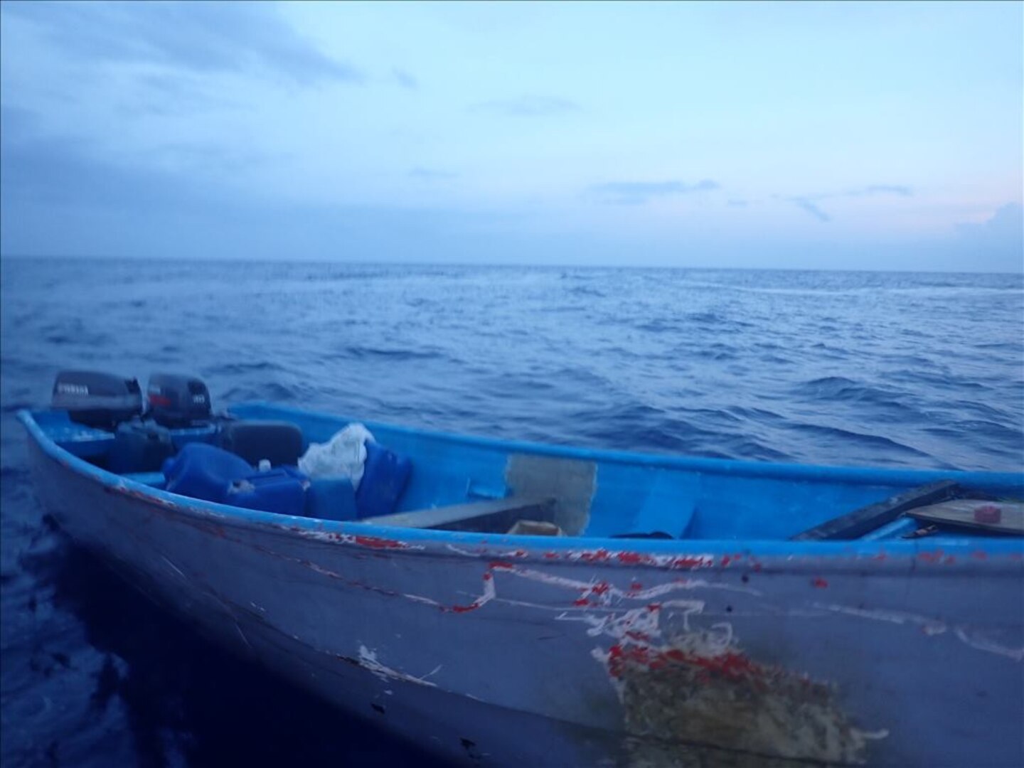 A vessel adrift in the Mona Passage shortly after the Coast Guard Cutter Joseph Tezanos crew interdicted the grossly overloaded vessel as it was transiting to Puerto Rico, May 15, 2023.  The cutter repatriated 19 migrants from this voyage to the Dominican Republic May 16, 2023, along with 77 other migrants from two separate interdictions. (U.S. Coast Guard photo)