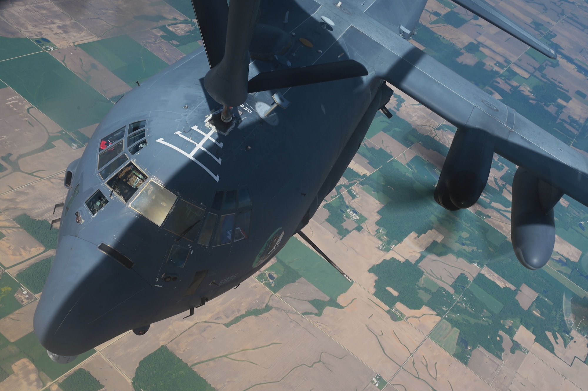 A U.S. Air Force AC-130J Ghostrider is refueled by a KC-135 Stratotanker from Fairchild Air Force during a special operations force exercise, May 9, 2023. The exercise provided the 509th WPS Airmen a chance to integrate with other weapons squadrons and their weapons systems to execute the mission. (U.S. Air Force photo by Staff Sgt. Lawrence Sena)