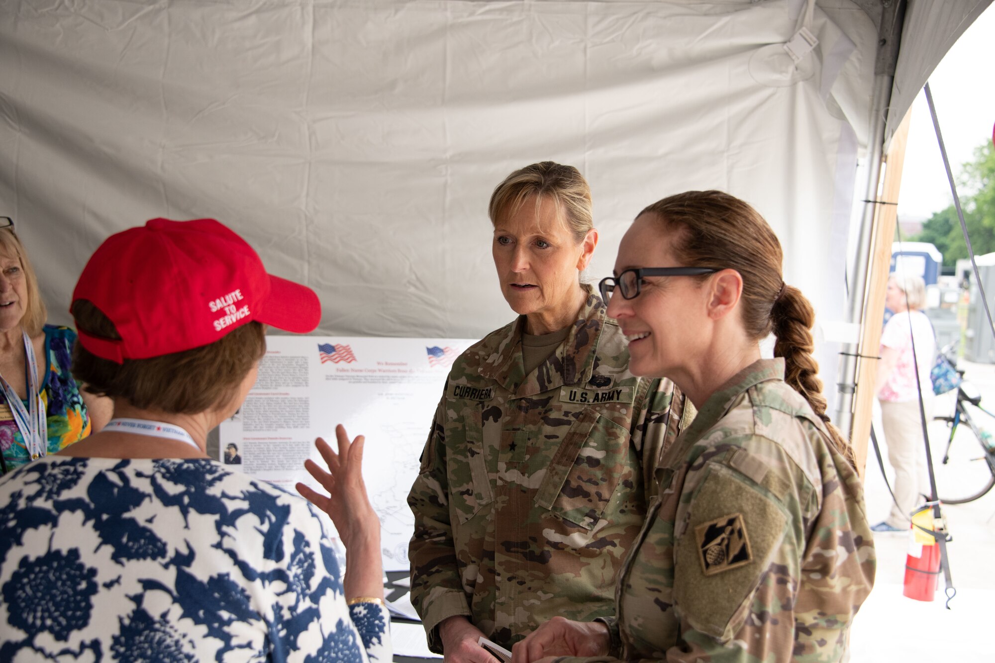 U.S. Army Brig. Gen. Joy L. Curriera, second from right, Commandant of the Eisenhower School of National Security, spoke with Vietnam veterans during the Vietnam “Welcome Home” Ceremony at the National Mall in Washington D.C., May 13, 2023. The national “Welcome Home” event was planned by the United States of America Vietnam War Commemoration, a congressionally-authorized organization launched by former President Barack Obama in 2012 to honor and pay tribute to Vietnam-era veterans, prisoners of war, and those missing-in-action, as well as their families. (U.S. Air Force photo by Senior Airman Daekwon Stith)