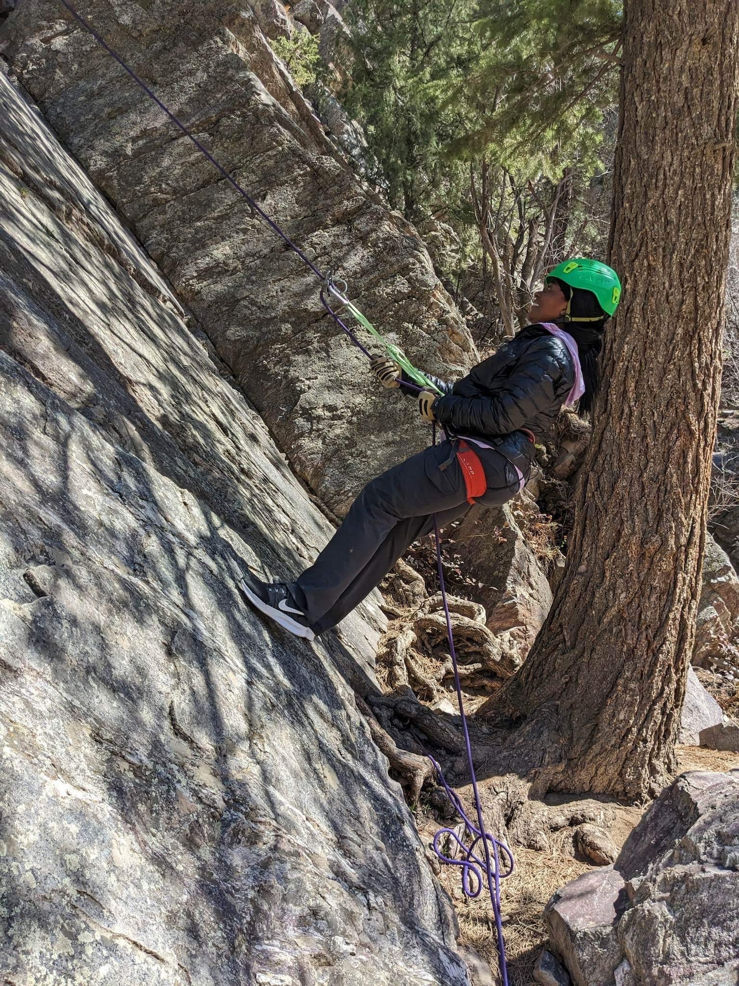 Mable Justice, Air Force Mortuary Affairs mortuary specialist, rappels during the Colorado Mountain School April 23, 2023. Justice attended the course in advance of her work with the efforts to recover remains from a C-124 Globemaster near Mount Gannett, Alaska. (Courtesy photo)