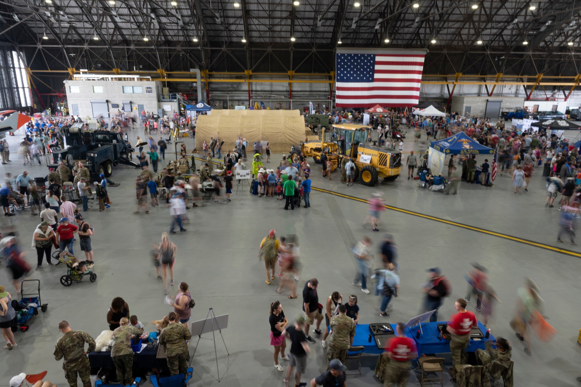 Hangar crowded with people