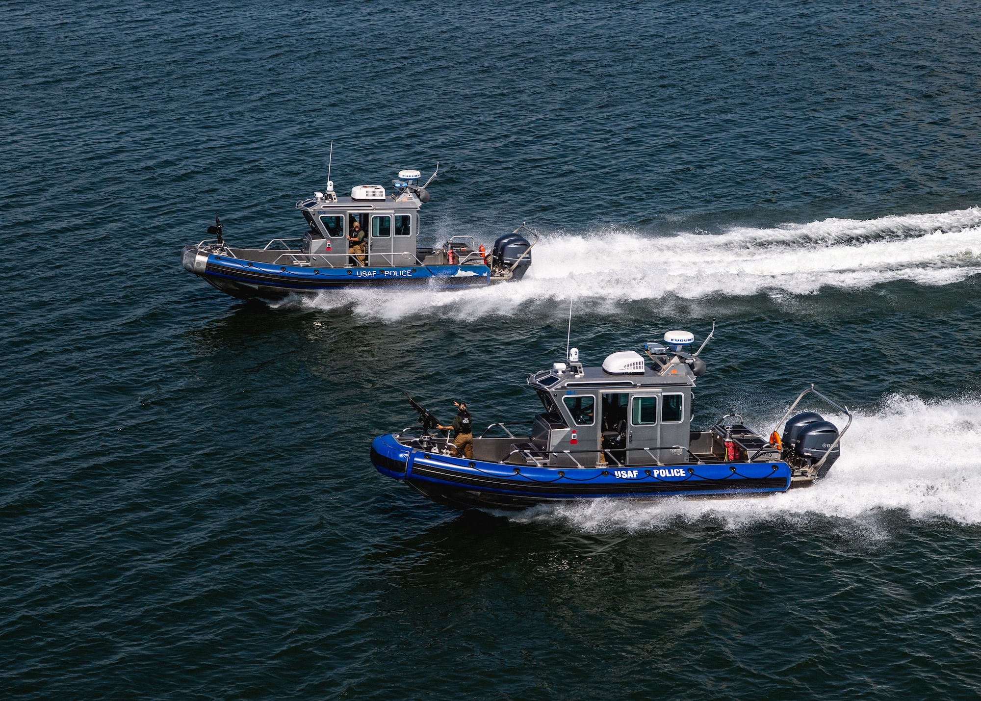 .S. marine patrol vessels assigned to the 6th Security Forces Squadron patrol the coastline along MacDill Air Force Base, Florida, during Operation Neptune Storm May 17, 2023. The operation included assets from the 6th Security Forces Squadron, U.S. Coast Guard, Tampa Fire Rescue, Florida Fish and Wildlife Commission, Tampa Police Department, and the Hillsborough County and Manatee County Sherriff’s Offices. The event demonstrated MacDill’s overwhelming maritime force protection capabilities employed to defend America’s premier power projection platform. (U.S. Air Force photo by Tech. Sgt. Alexander Cook)