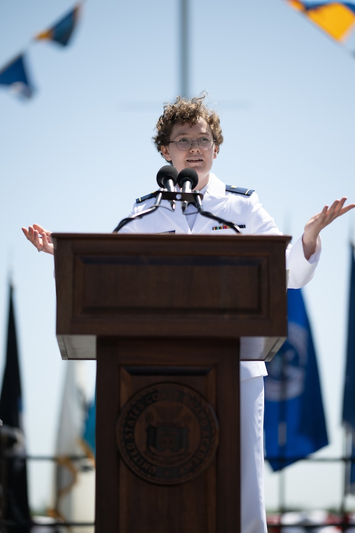 Coast Guard Ens. Christine Groves delivers a speech at the Coast Guard Academy during the 142nd Commencement Exercises May 17, 2023. Groves was the Distinguished Honor Graduate for the Class of 2023. (U.S. Coast Guard photo by Petty Officer 2nd Class Matthew Abban)