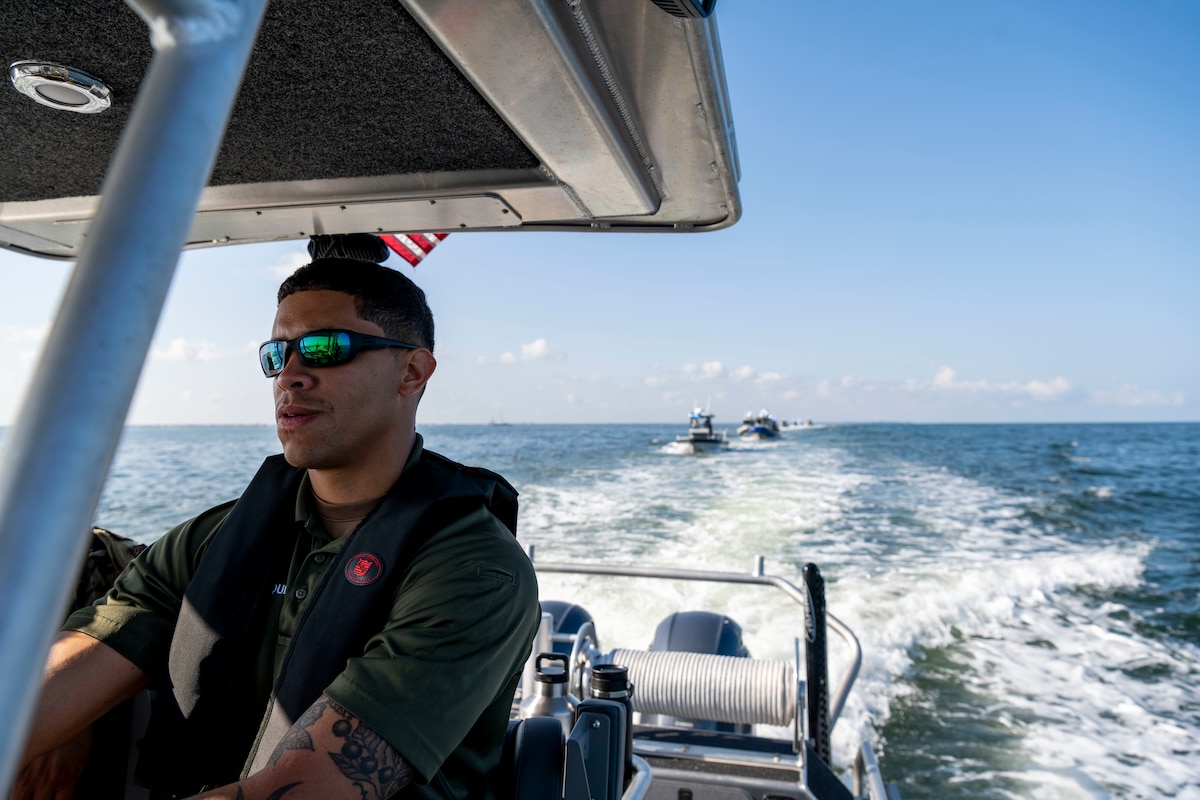 A U.S. Air Force Airman with the 6th Security Forces Squadron marine patrol unit, navigates the coastline along MacDill Air Force Base, Florida, during Operation Neptune Storm May 17, 2023.
