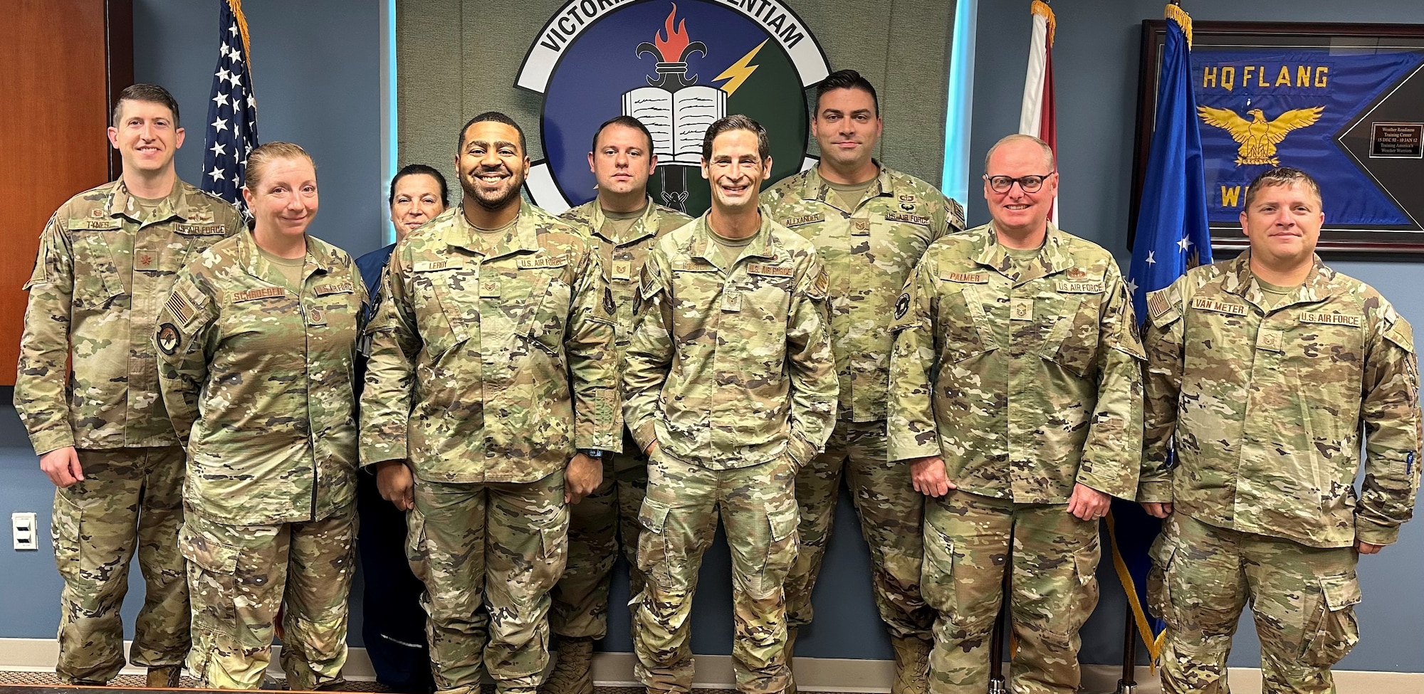 U.S. Air Force Airmen assigned to the 131st Training Flight, Florida Air National Guard, pose at unit headquarters located on Camp Blanding Joint Training Center in Starke, Florida, May 12,2023. The 131st TF received the 2022 Outstanding ANG SWC Unit of the Year. (Courtesy photo)