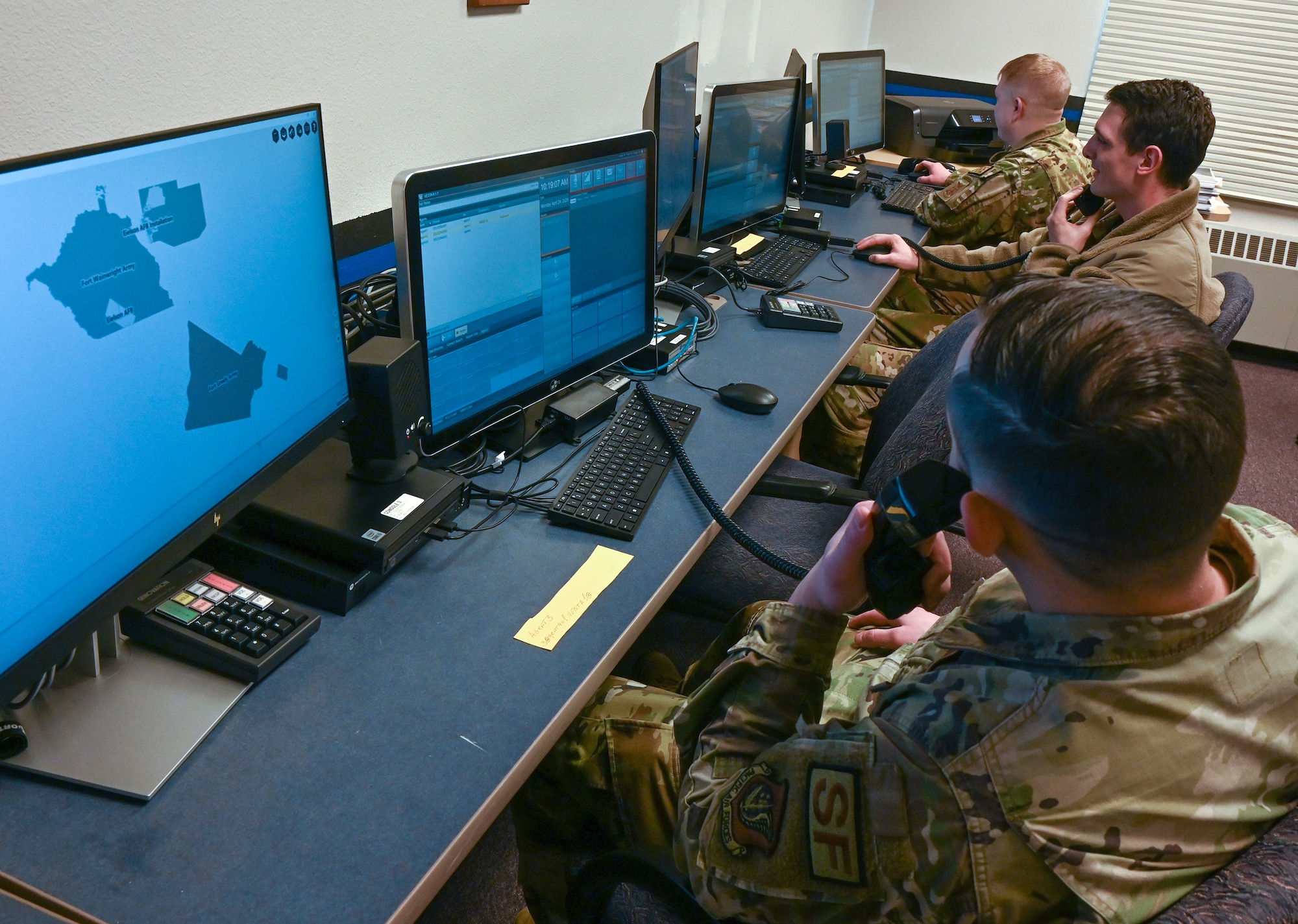 U.S. Air Force Airmen from the 354th Civil Engineering Squadron receive training on the updated 911 system April 27, 2023 at Eielson Air Force Base. Eielson Air Force Base recently changed to the Vesta E-911 system that provides a more streamlined and updated system for emergency dispatchers. (U.S. Air Force photo by Staff Sgt. Danielle Sukhlall)