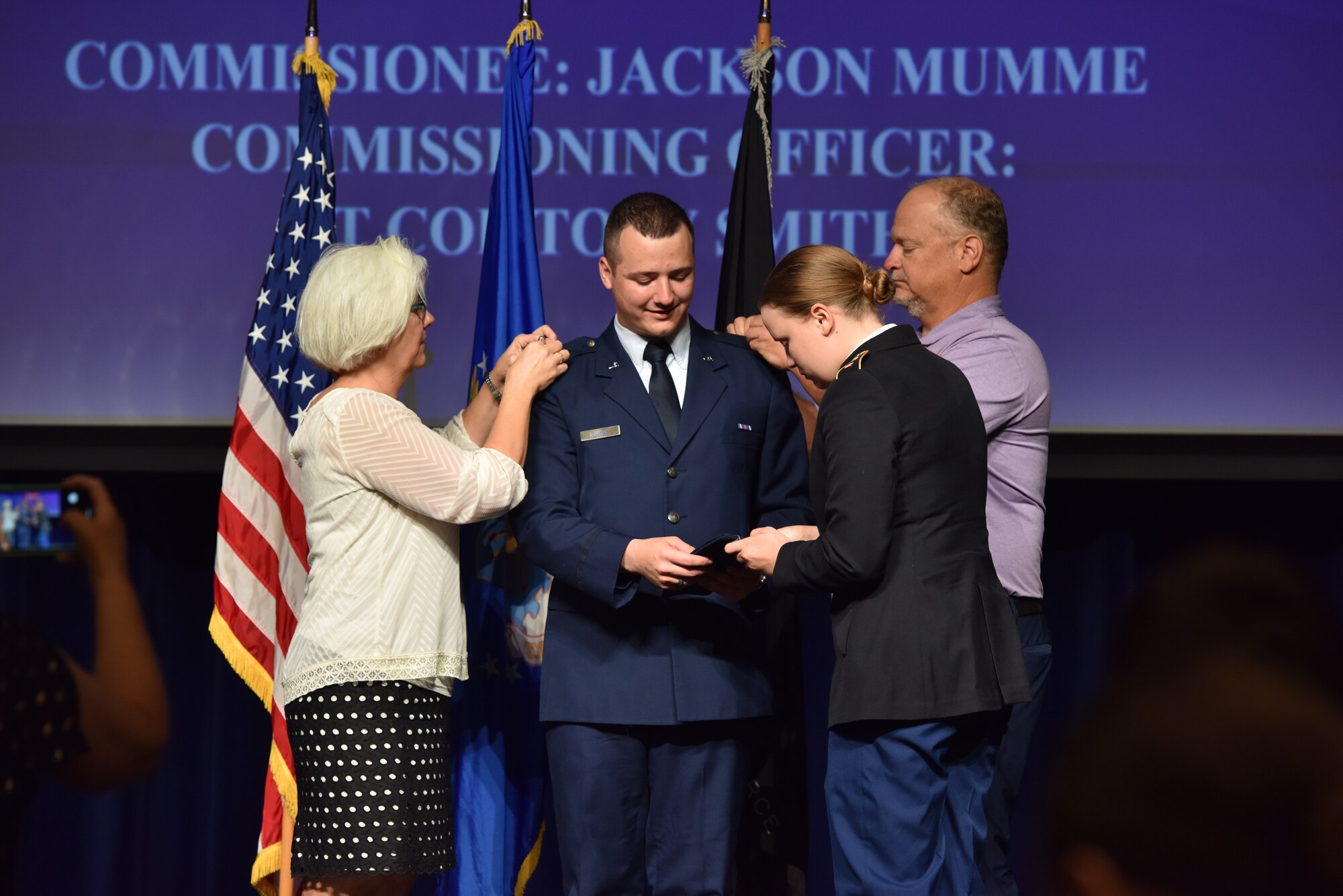 U.S. Air Force 2nd Lt. Jackson Mumme, Angelo State University graduate, gets his rank pinned on at Angelo State University, San Angelo, Texas, May 12, 2023. The new officers were joined by friends and family to celebrate their commissioning. (U.S. Air Force photo by Airman 1st Class Madison Collier)