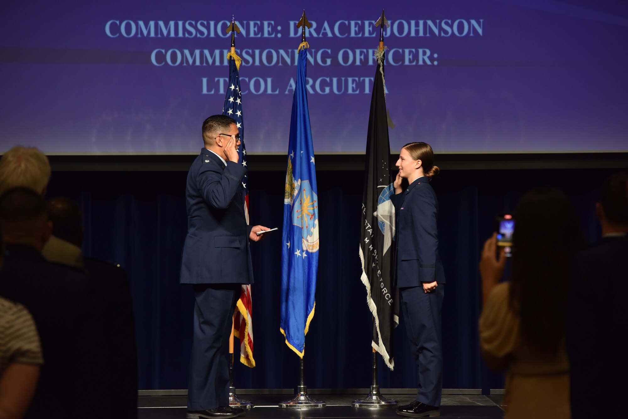 U.S. Air Force 2nd Lt. Dracee Johnson, Angelo State University graduate, takes the oath of office at Angelo State University, San Angelo, Texas, May 12, 2023. Four Angelo State University cadets were commissioned at the ceremony. (U.S. Air Force photo by Airman 1st Class Madison Collier)