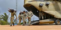 Members of Panama’s Servicio Nacional de Fronteras (SENAFRONT) transfer cargo from a CH-47 Chinook assigned to the 1st Battalion, 228th Aviation Regiment as part of exercise Keel Billed Toucan 2023.