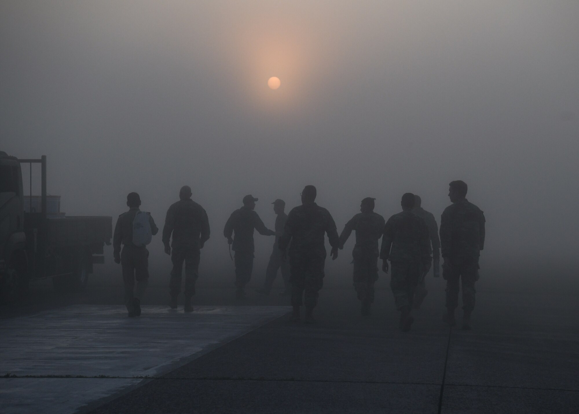 Members of the 374th Civil Engineering Squadron, 319th Expeditionary Squadron, and Japan Maritime Self-Defense Force prepare to perform a spall repair at Kanoya Air Base, Japan, May 15, 2023. Spall repairs are an efficient way to keep airfields serviceable by removing and replacing damaged parts of concrete slabs. (U.S. Air Force photo by Staff Sgt. Spencer Tobler)