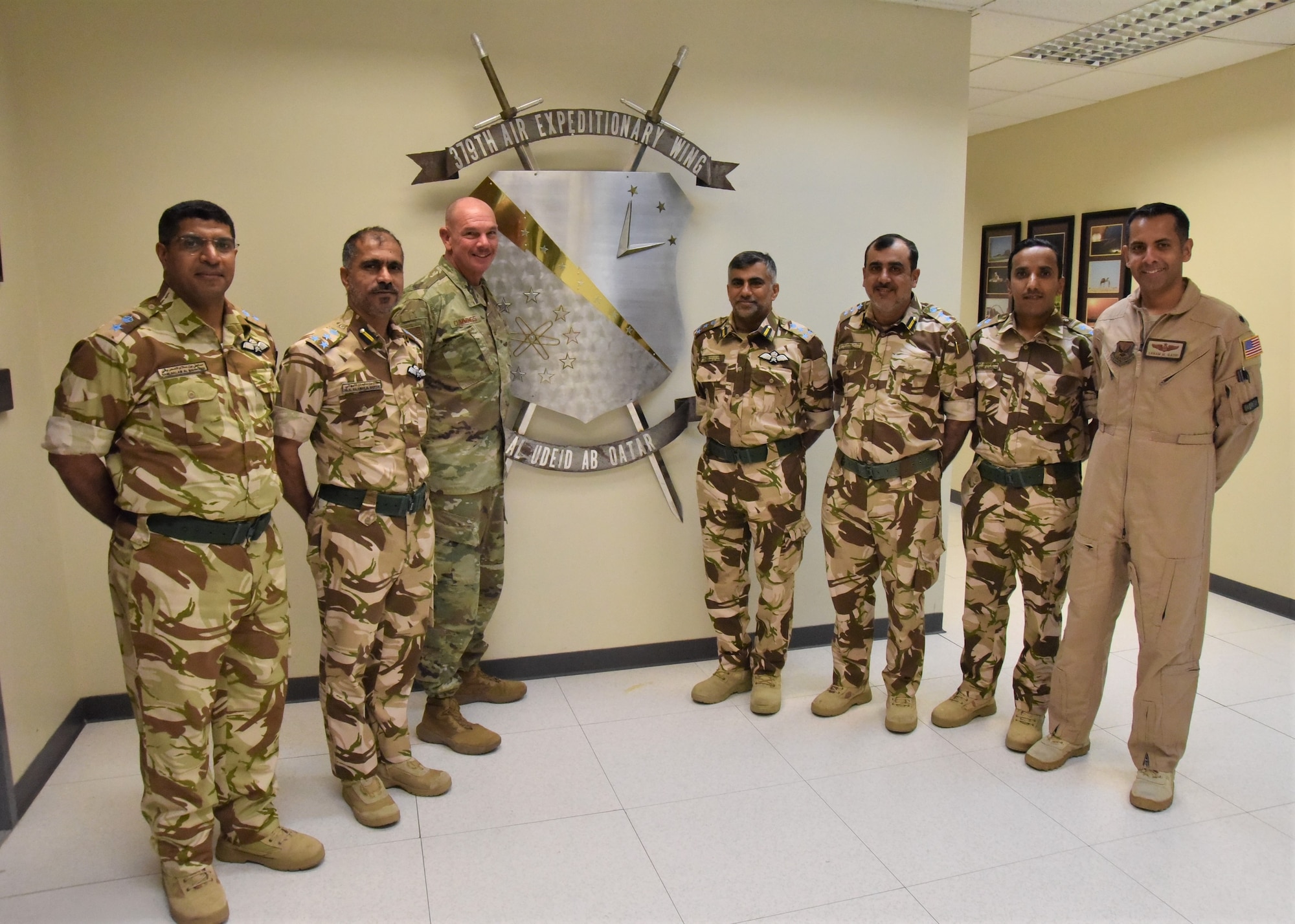 U.S. Air Force Col. Dennis Cummings, 379th Air Expeditionary Wing deputy commander, poses for a photo with Royal Air Force of Oman Air Commodore Said Hamed Khalfan Al Abdali, RAFO Musannah Air Base commander, and Air Commodore Hilal Sulaiman Abdullah Al Nabhani, RAFO Adam Air Base commander, during a visit May 9, 2023, at Al Udeid Air Base, Qatar. The visit served to provide ideas and recommendations to update and modernize the RAFO force and headquarters, and allowed for discussions on increased partnership opportunities for interoperability and strategic competition. (U.S. Air Force photo by Staff Sgt. Daniel Brosam)