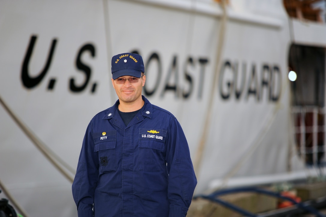 Cmdr. Lee Petty, commanding officer of Coast Guard Cutter Dependable, stands in front of his aging cutter. Petty relies on Pier 3 as a maintenance and repair platform for his ship, which is due for a major pier-side maintenance period in the Summer of 2012  (Coast Guard photo/CWO Donnie Brzuska).