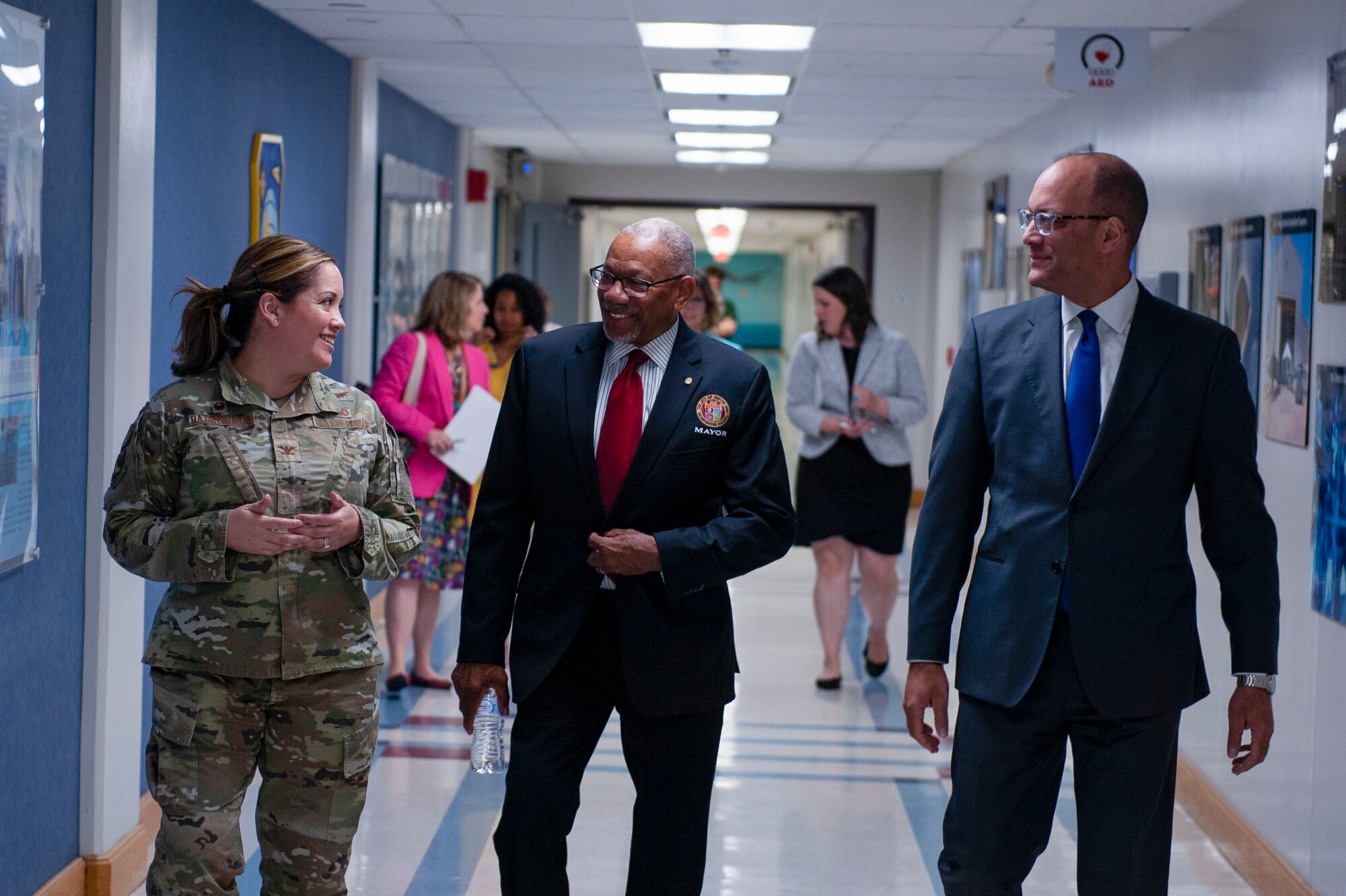 Col. Ariel Batungbacal (left), National Air and Space Intelligence Center commander, and Mr. Duane Harrison (right), NASIC chief scientist, speak with Dayton Mayor Jeffrey Mims Jr. (center) during his visit to the Center at Wright-Patterson Air Force Base, Ohio, May 9, 2023. During the tour, Batungbacal and Mims discussed how continued partnership between the city of Dayton and NASIC benefits the local community.