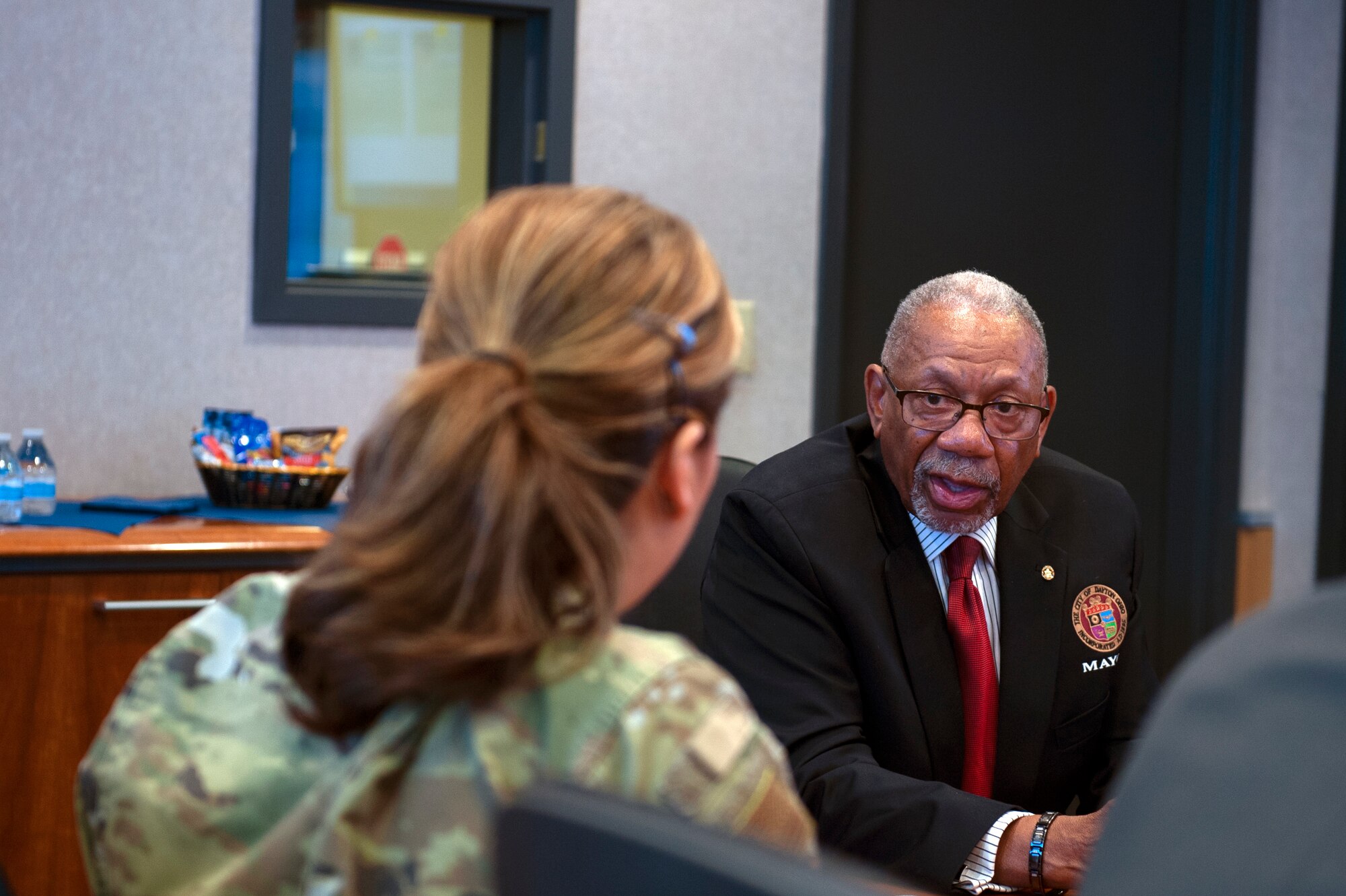 Dayton Mayor Jeffrey Mims Jr. discusses with Col. Ariel Batungbacal, National Air and Space Intelligence Center commander, his perspective on the relationship between the city and the Center during a visit to Wright-Patterson Air Force Base, Ohio, May 9, 2023.