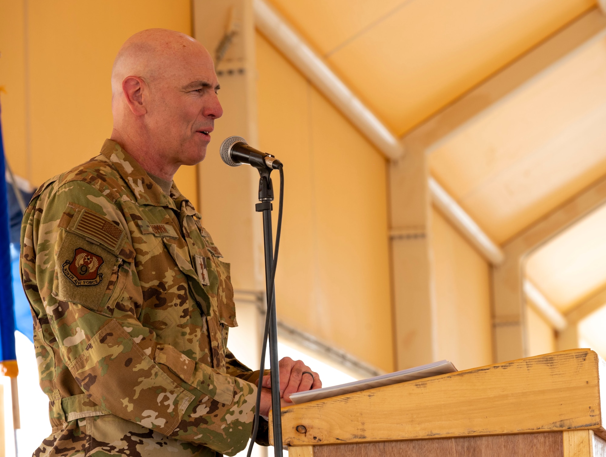 U.S. Air Force Maj. Gen. Clark Quinn, Ninth Air Force deputy commander, speaks during a change of command ceremony at Prince Sultan Air Base, Kingdom of Saudi Arabia, May 18, 2023. During the ceremony, Brig. Gen. William Betts relinquished command of the 378th AEW to Brig. Gen. Akshai Gandhi. The tradition of change of command ceremonies are to allow service members to witness their new leader assume the responsibility and trust associated with the position of commander. (U.S. Air Force photo by Senior Airman Stephani Barge)