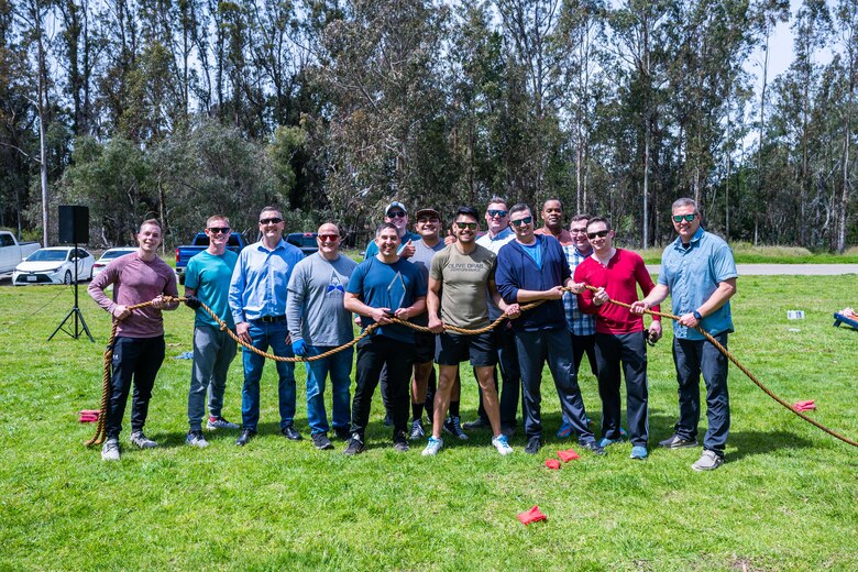 Officers of Space Delta 5 (DEL 5) stand together after winning an ‘Enlisted vs. Officer Tug-O-War’ Contest during DEL 5’s ‘Gemini’ at Cocheo Park on Vandenberg Space Force Base, Calif., April 7, 2023. The officers closed out a ‘best-of-three’ series in a third-round nail-bitter to take home the bragging rights.   (U.S. Space Force photo by Tech. Sgt. Luke Kitterman)