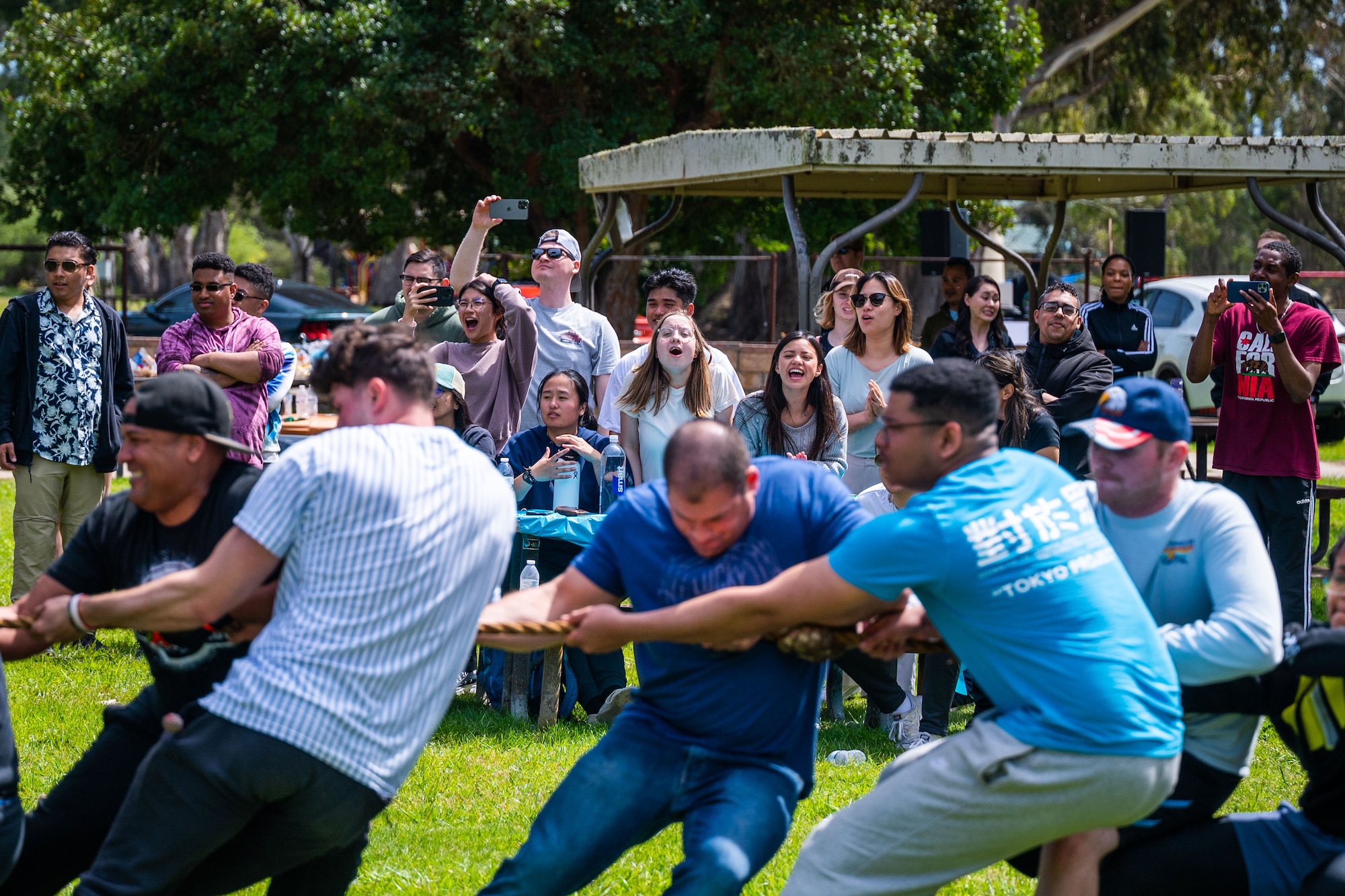 Members of Space Delta 5 (DEL 5) cheer on participants on an ‘Enlisted vs. Officer Tug-O-War’ Contest during DEL 5’s ‘Gemini’ at Cocheo Park on Vandenberg Space Force Base, Calif., April 7, 2023. The officers closed out a ‘best-of-three’ series in a third-round nail-bitter to take home the bragging rights.   (U.S. Space Force photo by Tech. Sgt. Luke Kitterman)