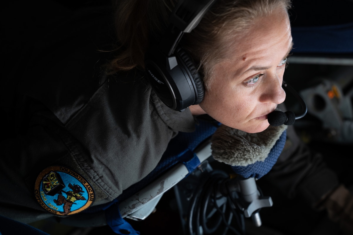 U.S. Air Force Air National Guard Staff Sgt. Stefanie Khodeir, 161st Air Refueling Wing boom operator, observes an approaching aircraft over Arizona, May 11, 2023. Boom operators, also known as in-flight refueling specialists, are tasked with safely transferring fuel from their aircraft to another during flight. (U.S. Air Force photo by Jasmyne Bridgers-Matos)