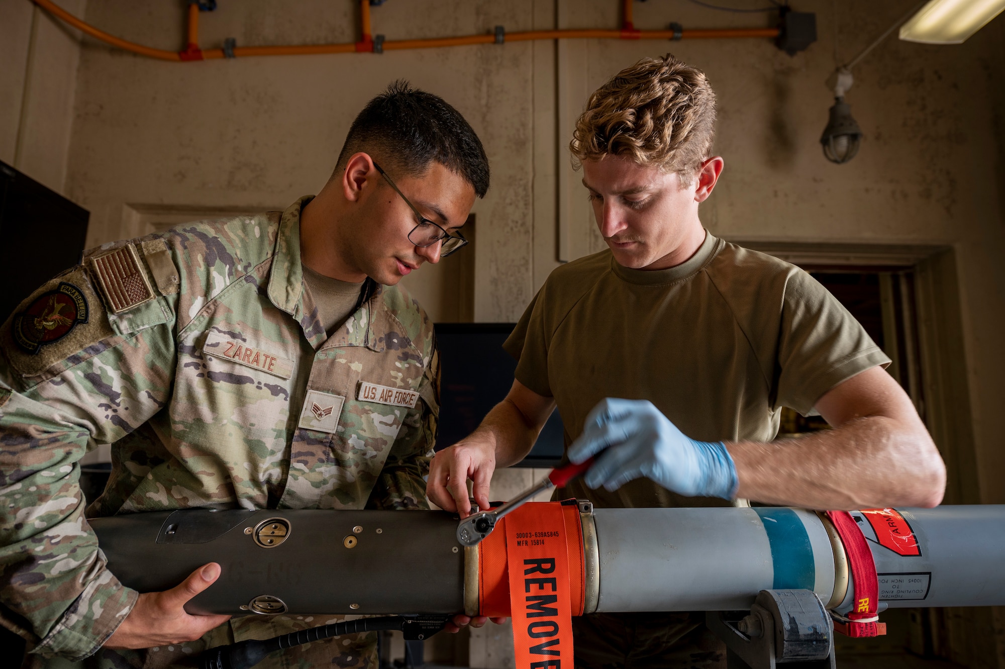 Men working on a missile