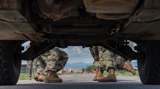  View under humvee being pulled by people