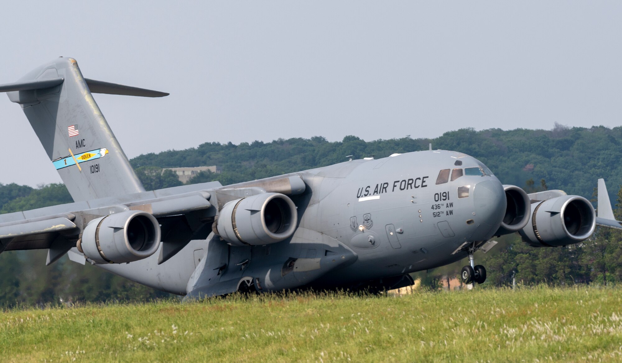 A C-17 Globemaster III assigned to the 436th Airlift Wing, Dover Air Force Base, DE, lands at Yokota Air Base, Japan, May 10, 2023.