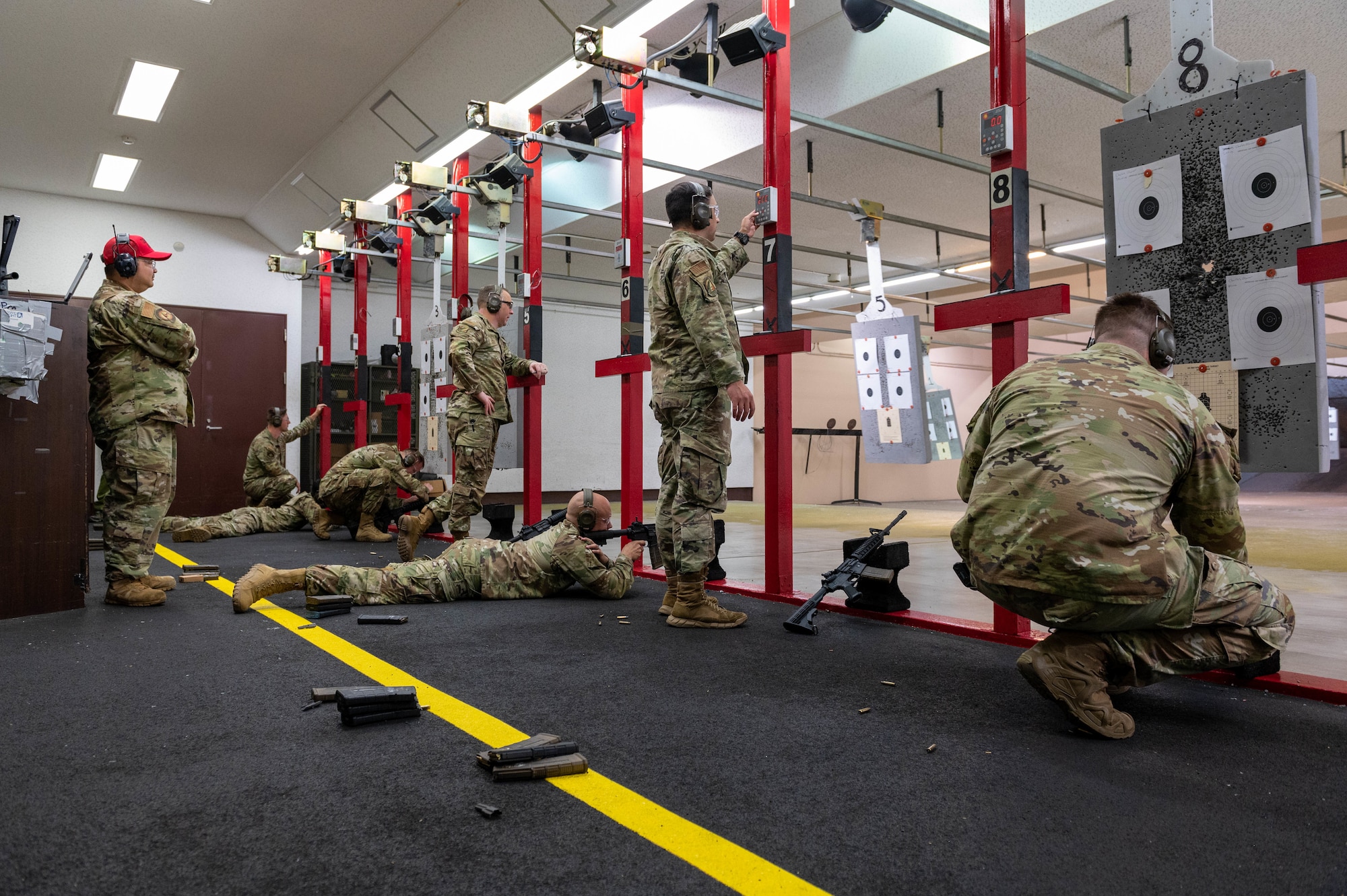 Airmen participate in a marksmanship competition in honor of Police Week.
