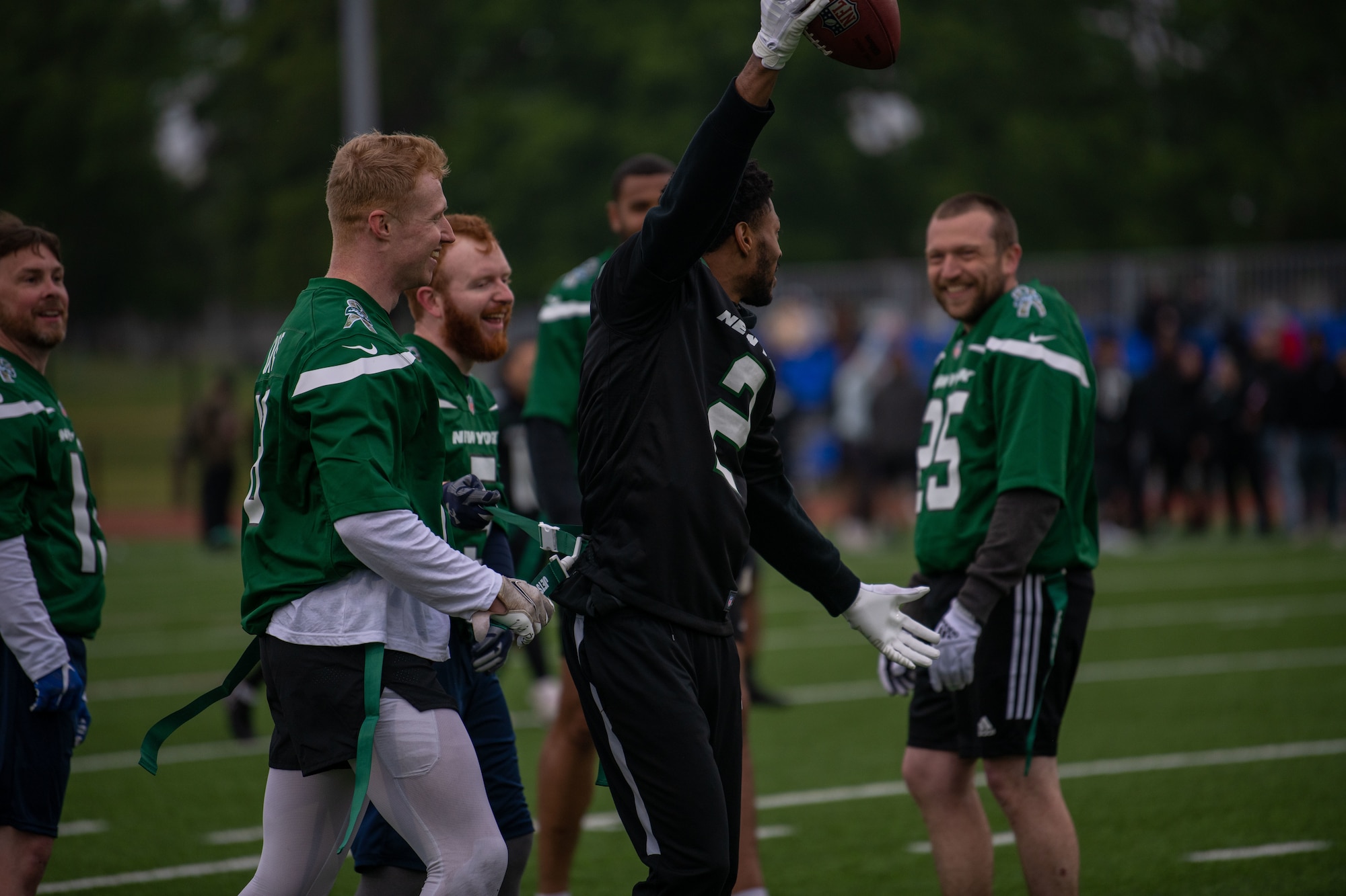 Men celebrating a great play in American Football