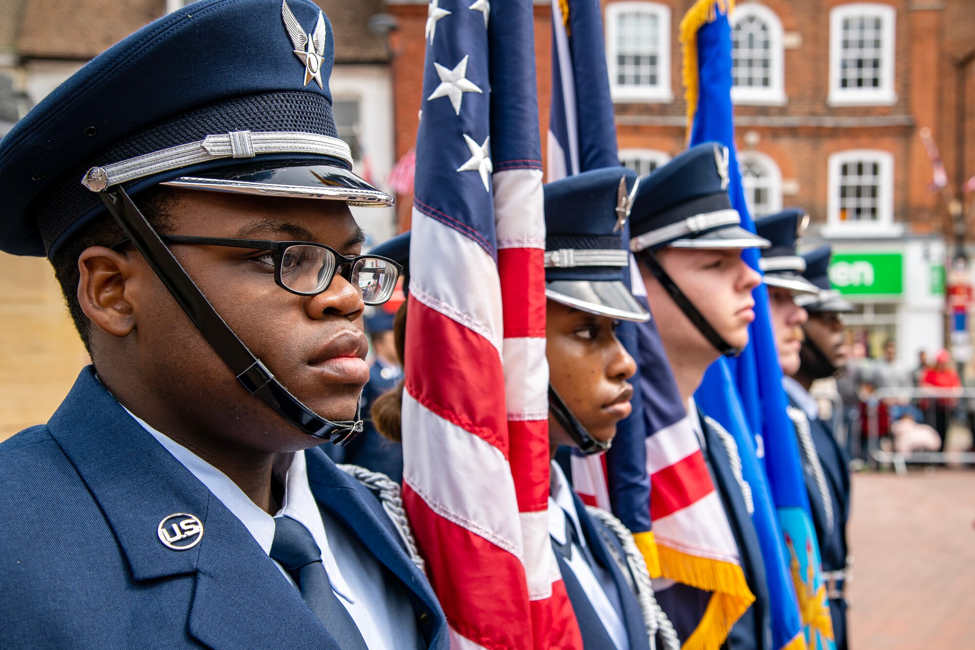 Members of the 423d Air Base Group honor guard, stand at attention during The Freedom of Huntingdon parade, in Huntingdon, England, May 19, 2023. In 2018 the 501st CSW was granted their freedom, an ancient tradition and high honor, by the city of Huntingdon and today Airmen exercised that freedom alongside local community members. (U.S. Air Force photo by Staff Sgt. Eugene Oliver)