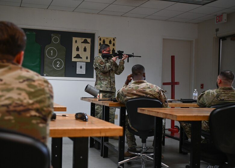 TSgt. Christopher Gray, 30th Security Forces flight sergeant, briefs the class on safety precautions to practice during the excellence competition at Vandenberg Space Force Base, Calif., May 16, 2023. National Police Week offers honor, remembrance, and peer support while allowing law enforcement, survivors and citizens to gather and pay homage to those who gave their lives in the line of duty. (U.S. Space Force photo by Senior Airman Tiarra Sibley)