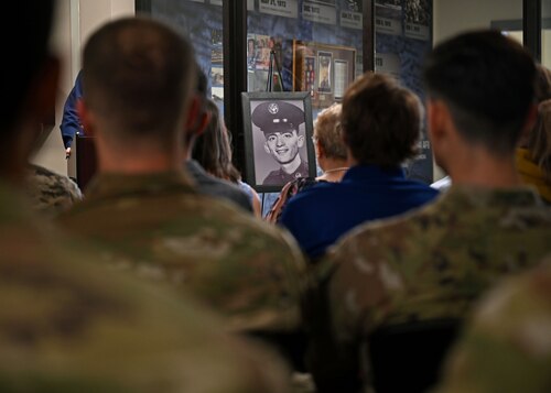 A picture of U.S. Air Force Sgt. Dale Brandenburg is on display during the rededication of Brandenburg Hall at Goodfellow Air Force Base, Texas, May 12, 2023. Brandenburg served in the Vietnam War as EC-47 maintenance technician. (U.S. Air Force photo by Senior Airman Sarah Williams)