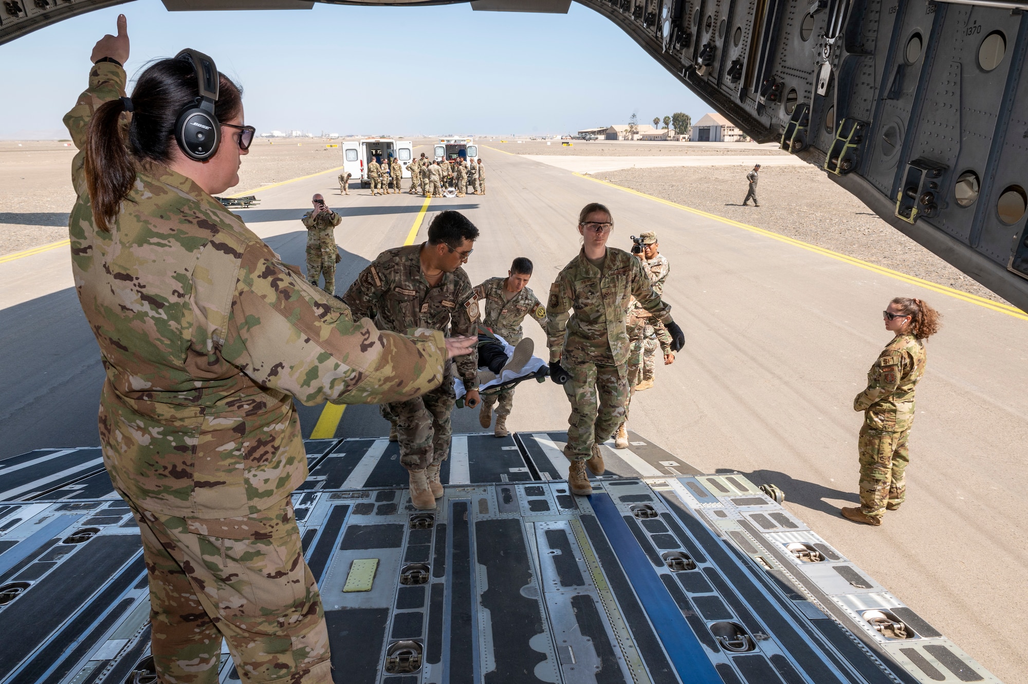 West Virginia Air National Guard and Peruvian Air Force conduct a patient transport scenario at Pisco Air Base, Peru, May 10, 2023, as part of Cooperacion IX.