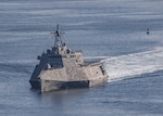 The Independence-variant littoral combat ship USS Canberra (LCS 30) departs San Diego Harbor for a routine underway off the California Coast. Littoral Combat Ships are fast, optimally manned, mission-tailored surface combatants that operate in near-shore and open-ocean environments, winning against 21st-century coastal threats. LCS integrates with joint, combined, manned and unmanned teams to support forward presence, maritime security, sea control and deterrence missions around the globe. (U.S. Navy photo by Mass Communication Specialist 1st Class Mark D. Faram)