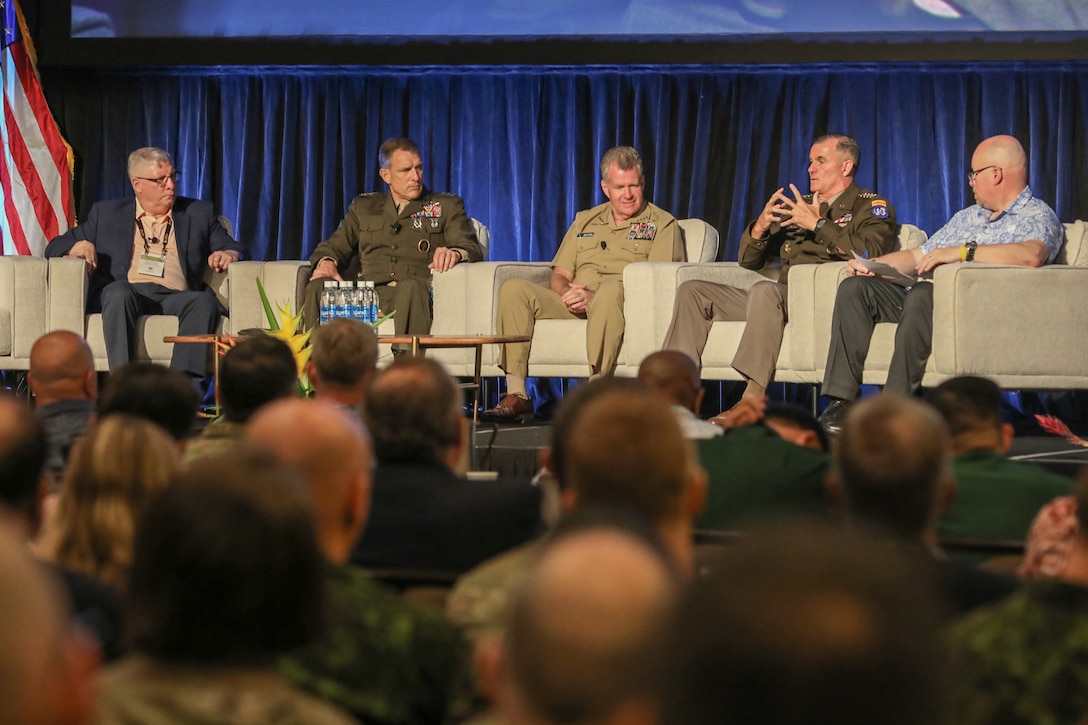 U.S. Marine Corps Lt. Gen. Frank Donovan, the vice commander, United States Special Operations Command, left, U.S. Navy Adm. Samuel J. Paparo, the commander, United States Pacific Fleet and U.S. Army Gen. Charles A. Flynn, the commanding general, U.S. Army Pacific, discuss the changes in warfare during a panel discussion at the 10th Annual Land Forces Pacific Symposium and Exposition 2023, in Honolulu, Hawaii, May 16, 2023. (U.S. Army photo by Olivia Van Den Heuvel)