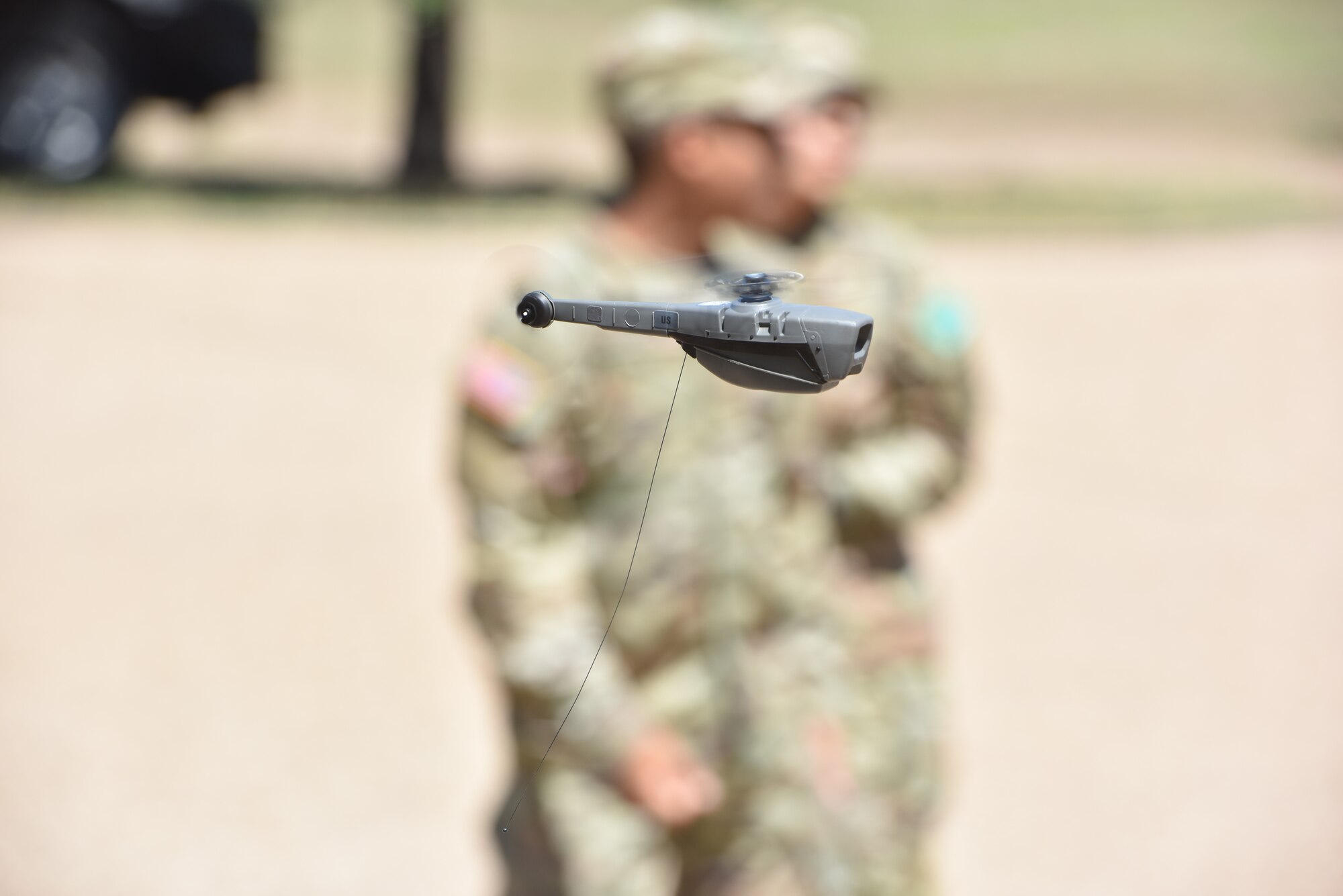 A Black Hornet 3 drone, a personal reconnaissance system, is flown during Police Week at Goodfellow Air Force Base, Texas, May 17, 2023. The Black Hornet 3 was a part of a drone demonstration put on by the 17th Security Forces Squadron. (U.S. Air Force photo by Airman 1st Class Madison Collier)