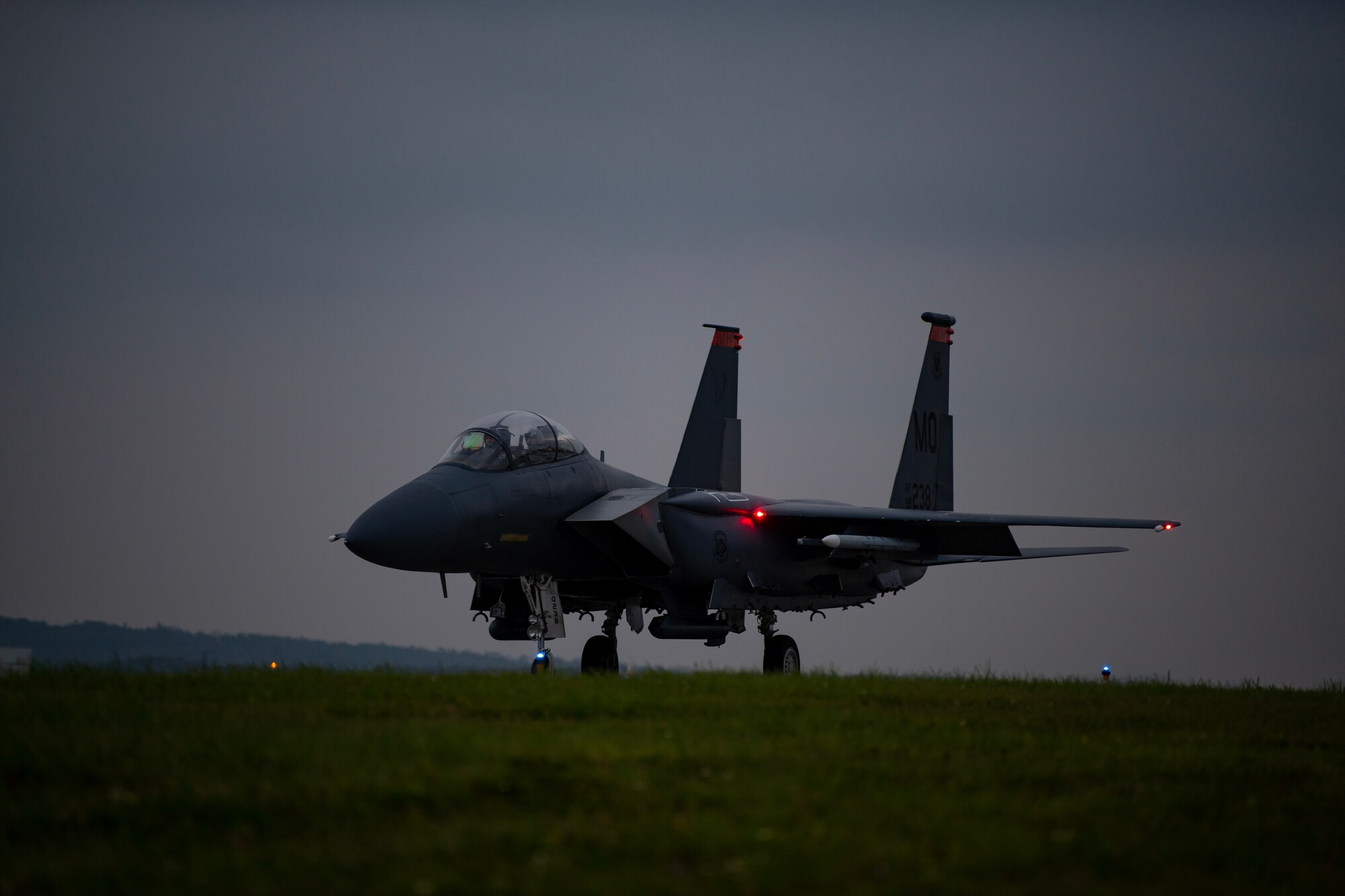 An F-15E Strike Eagle assigned to the 391st Fighter Squadron taxis down the flightline at Kadena Air Base, Japan, May 17, 2023. Throughout the week, the Strike Eagles flew evening sorties in support of the bilateral exercise, Southern Beach. Night flying operations hone the skills necessary for aircrew to successfully fly and fight in low to no visibility environments. (U.S. Air Force photo by Staff Sgt. Jessi Roth)