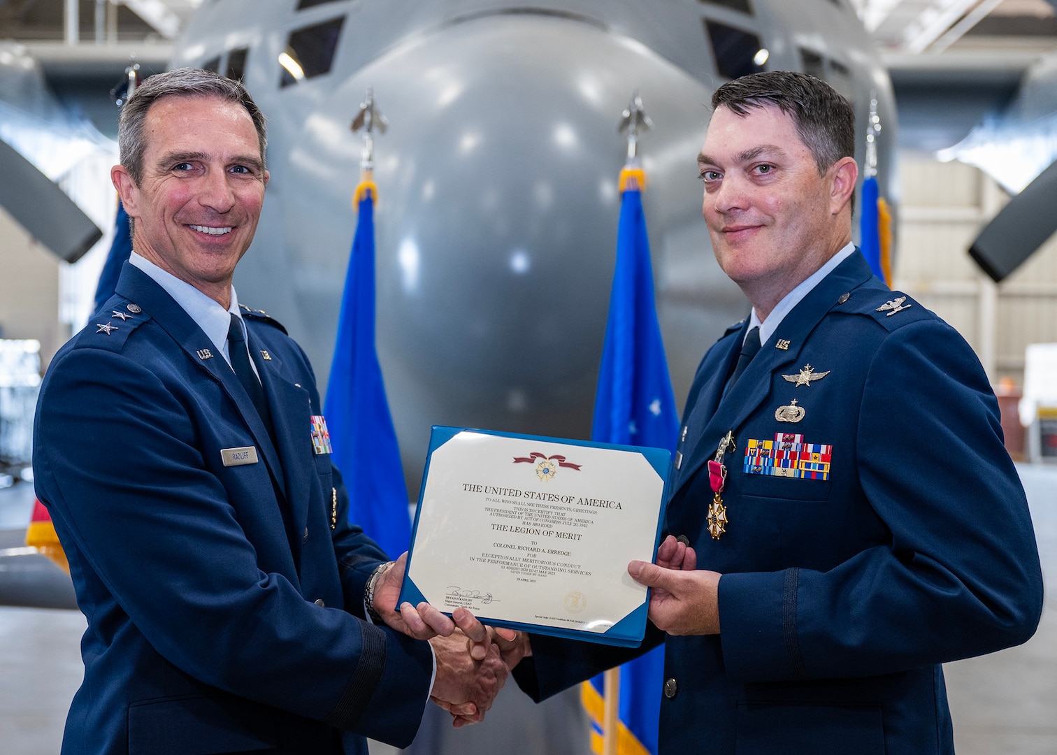 Col. Richard A. Erredge receives the Legion of Merit from Maj. Gen. Bryan P. Radliff during the 960th Cyberspace Wing change of command ceremony at Joint Base San Antonio-Lackland, Texas on May 7, 2023. (U.S. Air Force photo by Brian Boisvert)