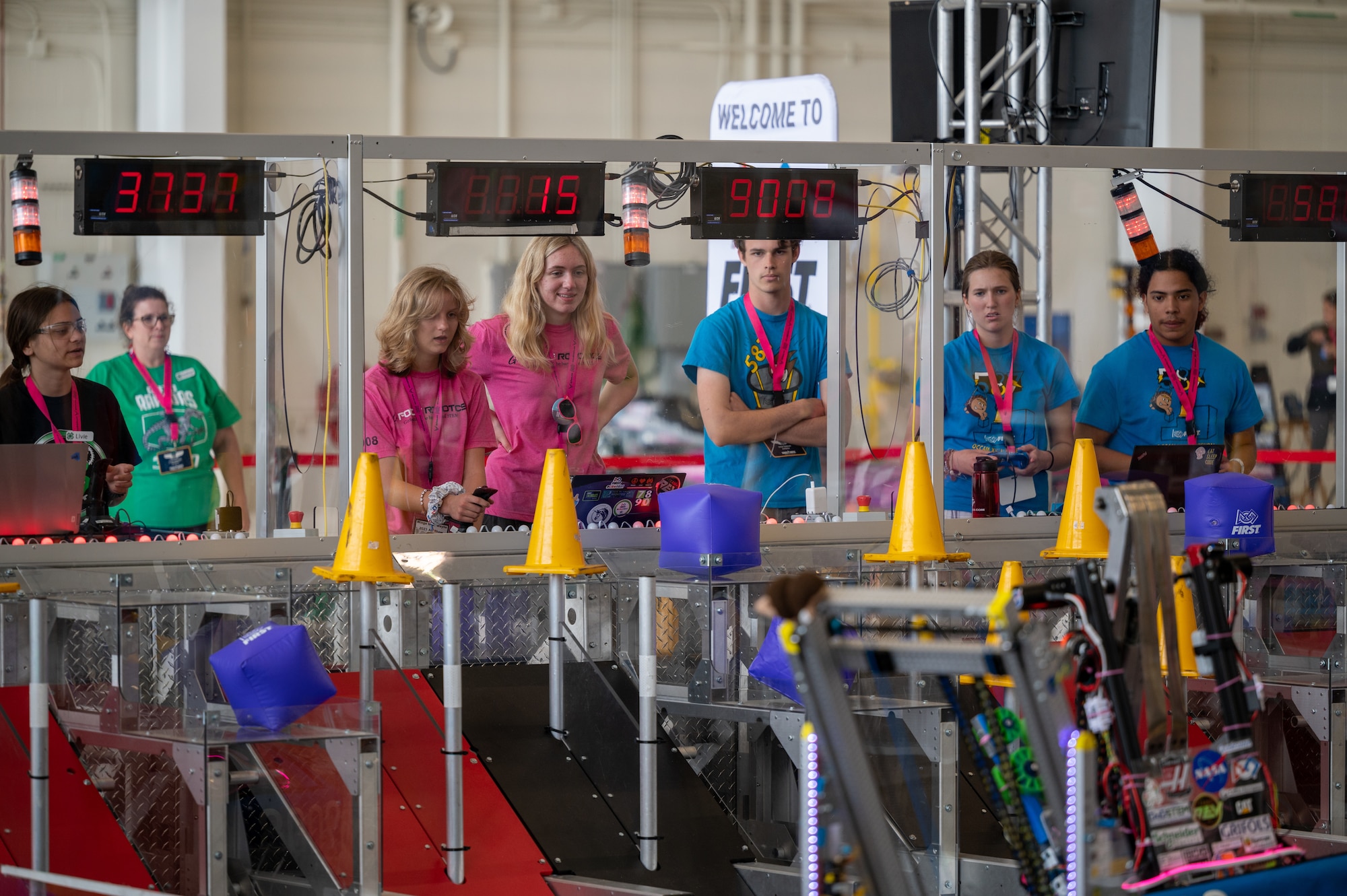 Three robotics teams compete against each during the 2023 Wings Over Wayne Air Show at Seymour Johnson Air Force Base, North Carolina, May 21, 2023. Wings over Wayne is a two-day event open to the community that features a variety of aerial demonstrations, ground performances, aircraft static displays, and other events. (U.S. Air Force photo by Airman 1st Class Leighton Lucero)