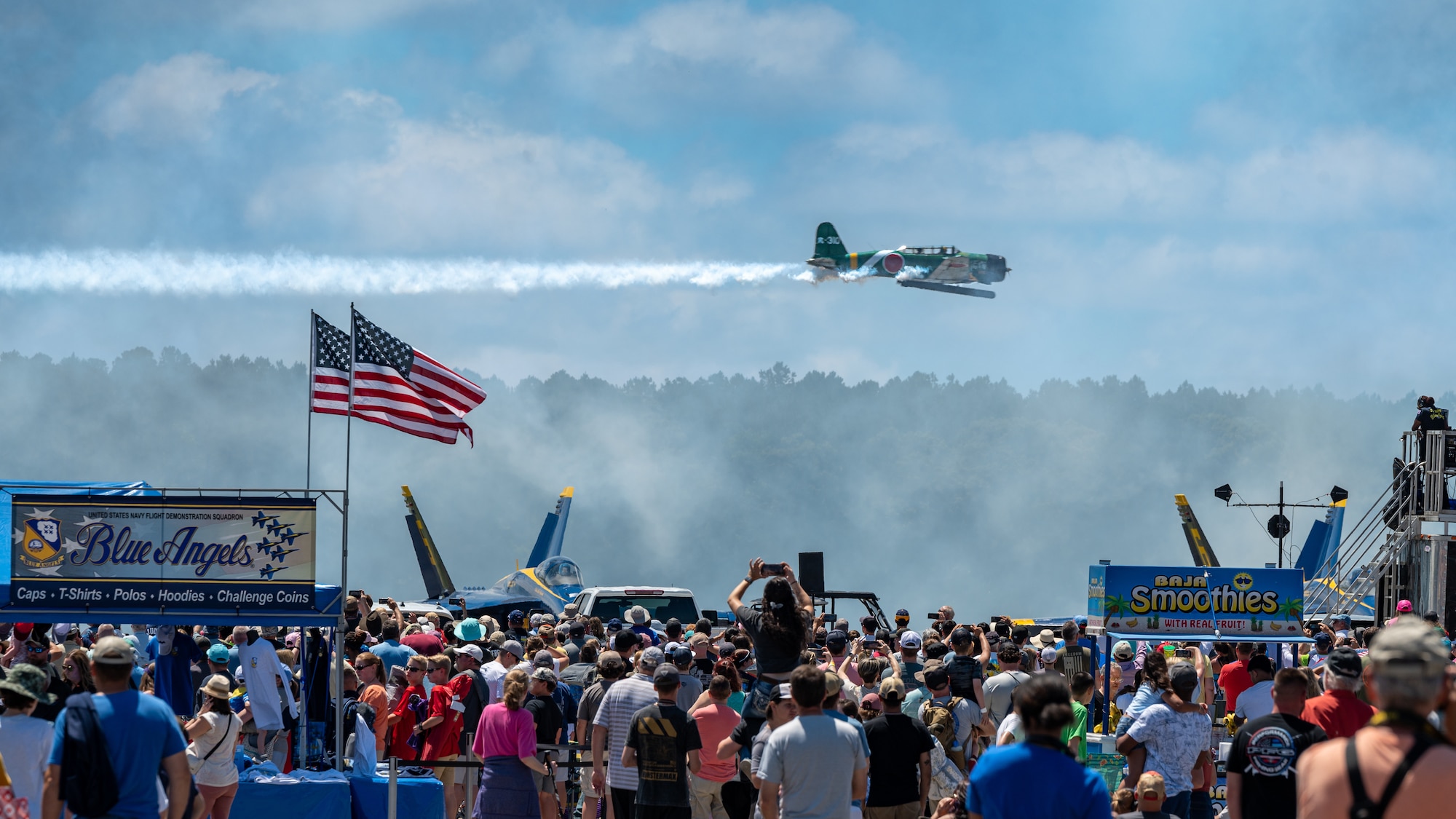 A Tora Tora Tora Warbird performer conducts an air-to-ground combat demonstration during the 2023 Wings over Wayne Air Show and Science and Technology Expo at Seymour Johnson Air Force Base, North Carolina, May 20, 2023. The Tora Tora Tora Warbirds began in 1972 after the 6 replica Japanese aircraft were used in the movie “Tora! Tora! Tora!” and were donated to the Commemorative Air Force. (U.S. Air Force photo by Airman 1st Class Leighton Lucero)