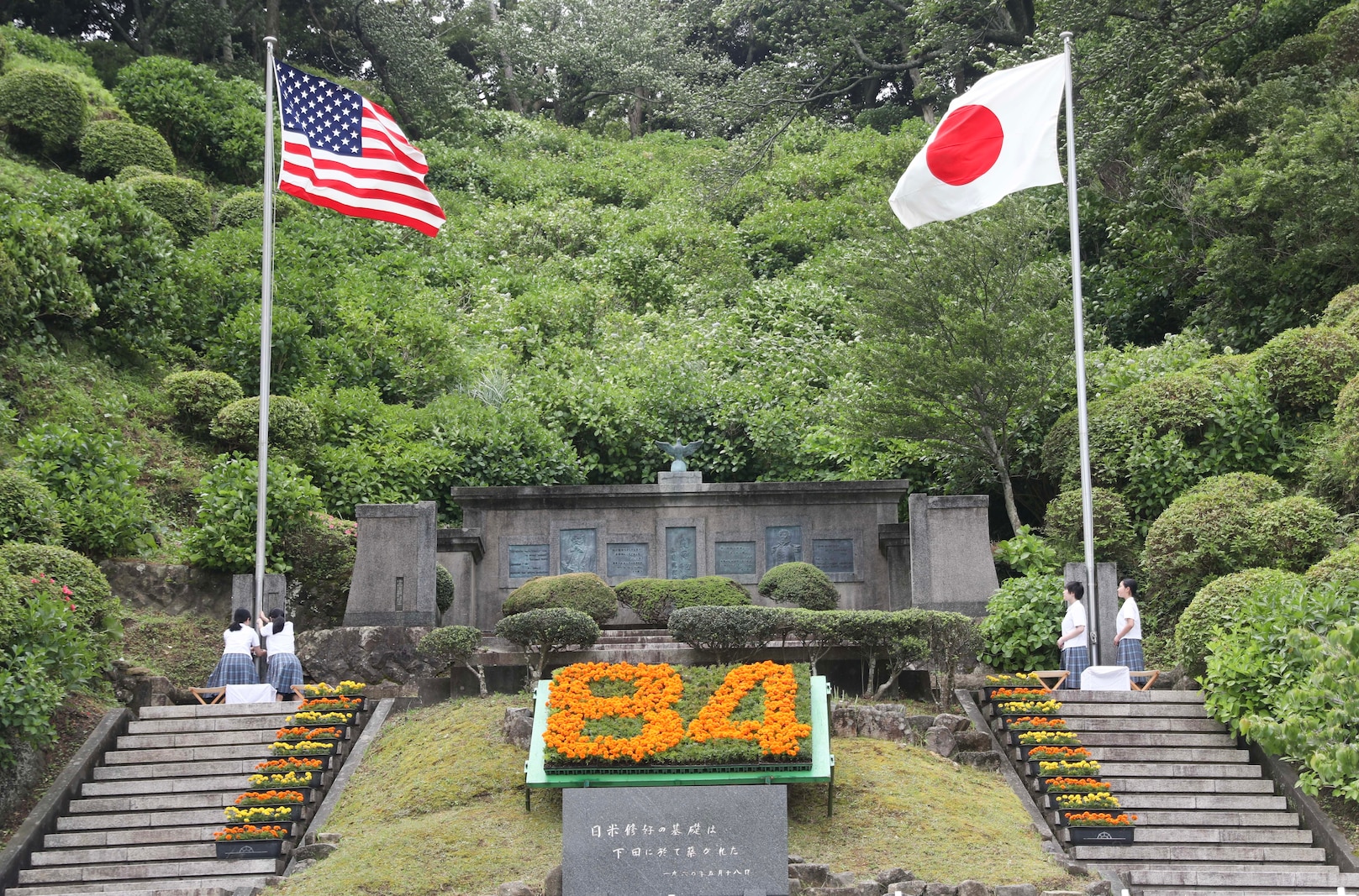 The Japanese and American flags are raised during the official ceremony for the 84th Black Ship Festival, May 20. The Black Ship Festival is held annually in Shimoda to commemorate the arrival of Commodore Matthew Perry to Japan in 1853, a historical event that marked the beginning of diplomacy and trade agreements between the U.S. and Japan.