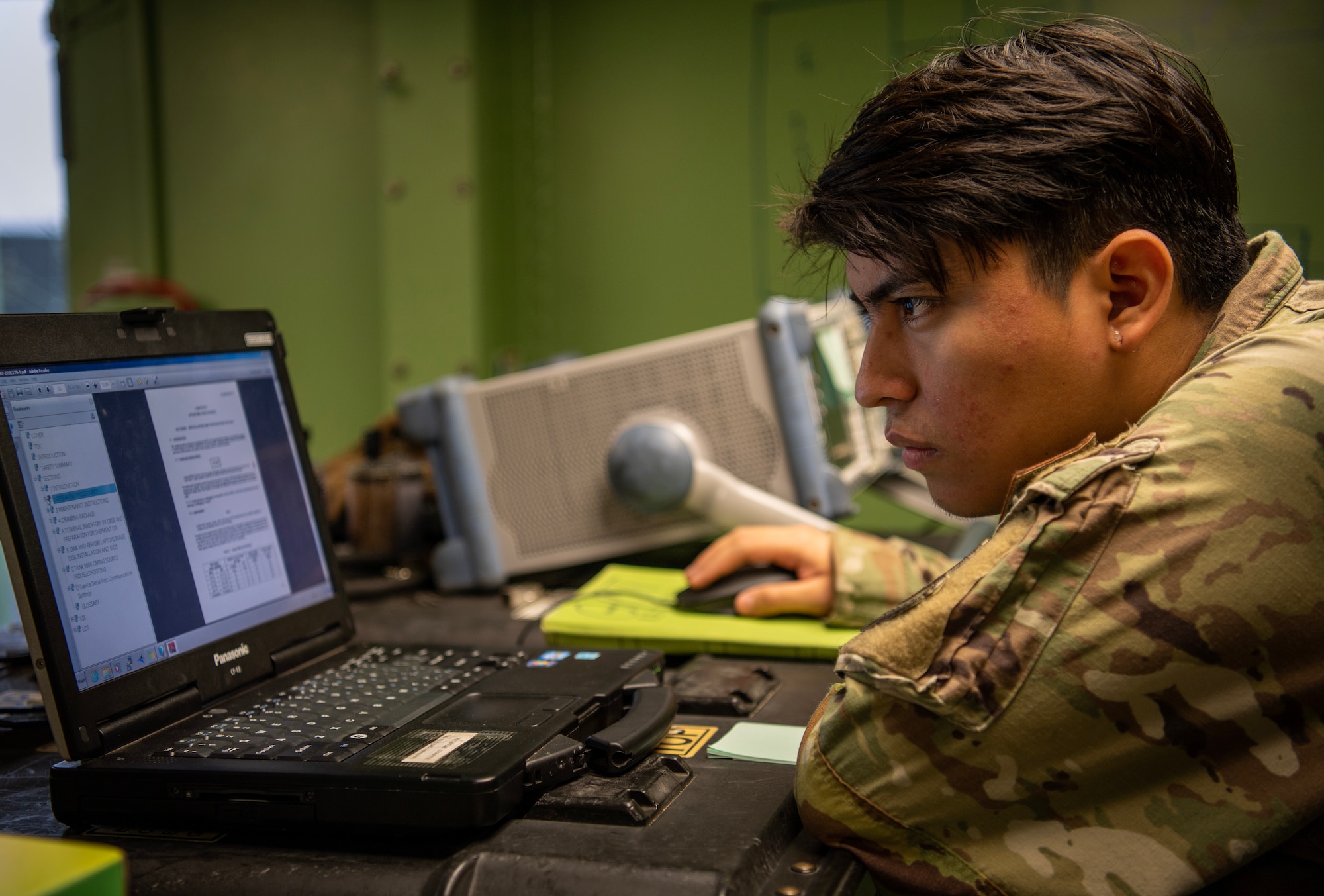 U.S. Air Force Senior Airman Carlos Perez Ortiz, 607 Air Communications Squadron, radio frequency transmission system technician, works to establish a network connection to a ground multiband terminal during exercise Enduring PACE, May 18, 2023, at Osan Air Base, Republic of Korea.