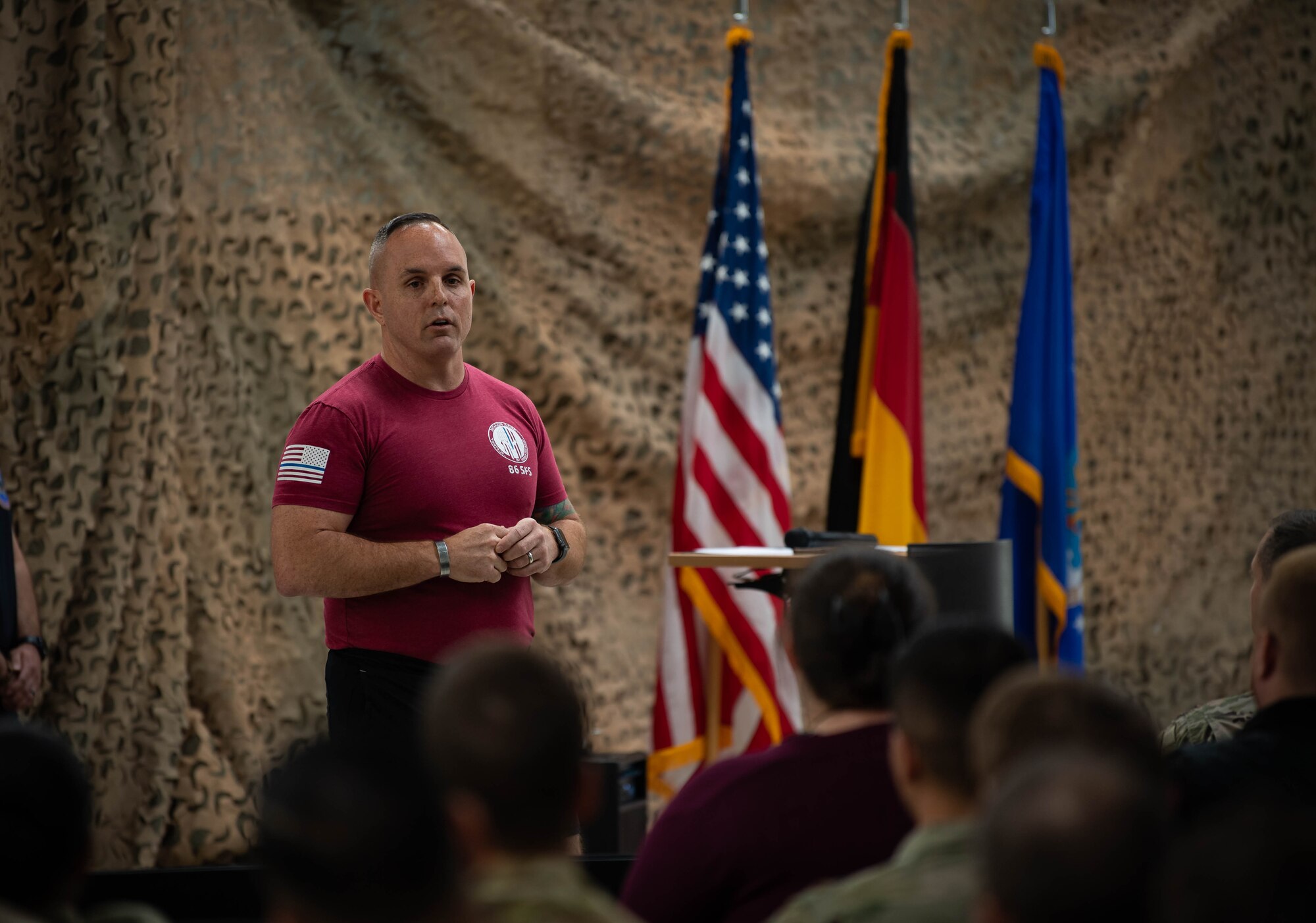 U.S. Air Force Chief Master Sgt. Chad VanCleave-Goff, 86th Security Forces Squadron senior enlisted leader, addresses participants of police week during a opening ceremony of Police Week, at Ramstein Air Base, Germany, May 15, 2023. In 1963, President John F. Kennedy signed a proclamation which designated May 15 as Peace Officers Memorial Day and the week in which that date falls as Police Week. National Police Week offers honor, remembrance, and peer support, while allowing law enforcement, survivors, and citizens to gather and pay homage to those who gave their lives in the line of duty. (U.S. Air Force photo by Airman 1st Class Jared Lovett)