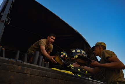 Paraguayan army members receive fire retardant gear donated by the Military Division of the Commonwealth of Massachusetts as part of the National Guard’s State Partnership Program in Asunción, Paraguay, May 18, 2023. More than 1,000 sets of personal protective firefighting equipment were donated by Massachusetts fire departments, facilitated by the Massachusetts National Guard and the Military Division of the Commonwealth of Massachusetts.