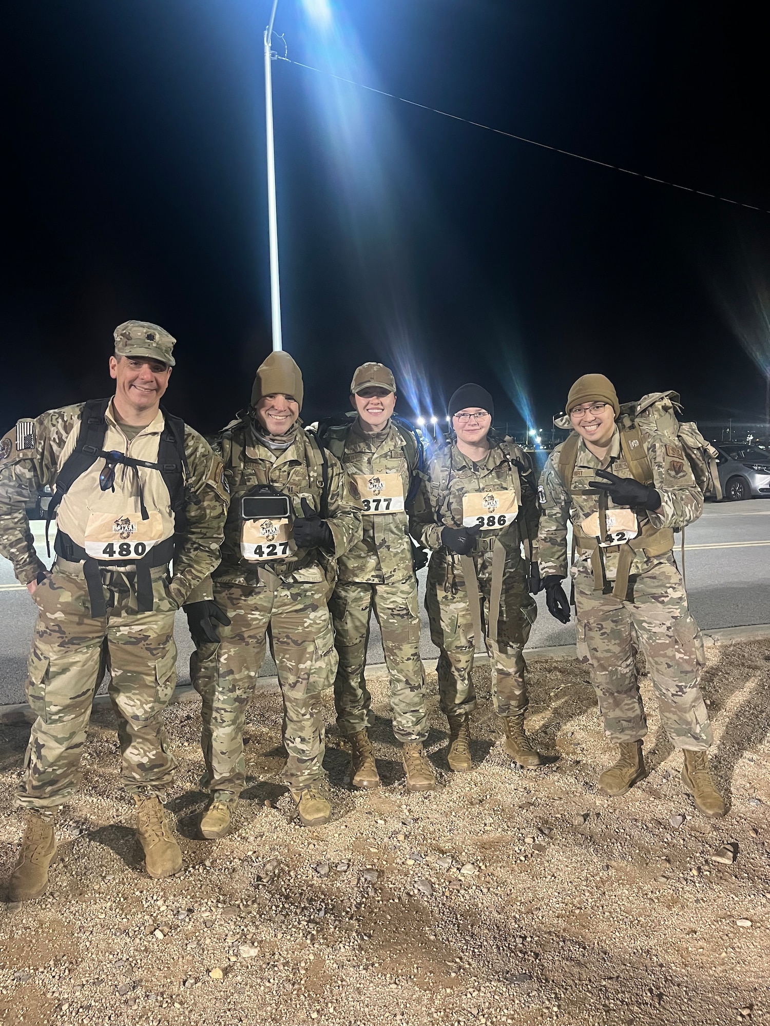 Lt. Col. William Selber, TSgt David Eckstein, SrA Alexis Cassidy, SSgt Misty Younce, and TSgt Joshua Hurt current and former members of the 451st Intelligence Squadron at the start line of the Bataan Memorial Death March.