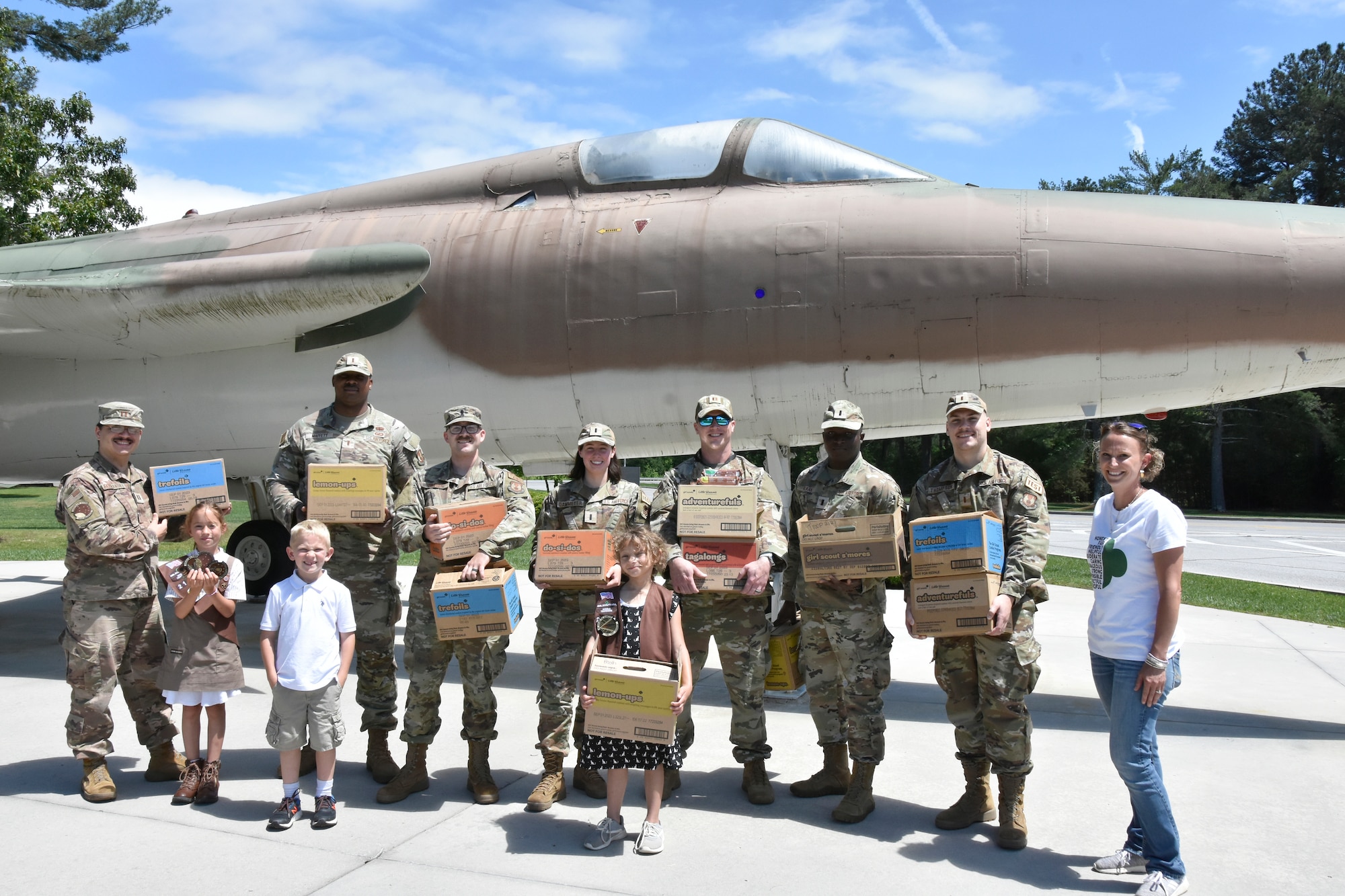 Tullahoma Girl Scouts from Troop 2127 visit Arnold Air Force Base, Tenn., May 17, 2023, to deliver Girl Scout cookies to Arnold AFB service members to show appreciation for their service. Members of the Arnold AFB Company Grade Officers’ Council accepted the cookies to distribute them to fellow military members on base. (U.S. Air Force photo by Bradley Hicks)
