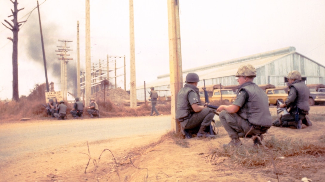 United States Air Force Security Police disperse along the perimeter of Tan Son Nhut Air Base, South Vietnam, in response to a Viet Cong attack on the base. Jan. 1, 1968. OSI District 50 Headquarters was located at Tan Son Nhut. (U.S. Air Force photo by Sgt Robrt F. Witowski)