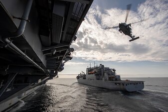 USS Gerald R. Ford (CVN 78) replenishes from USNS Medgar Evers (T-AKE 13).