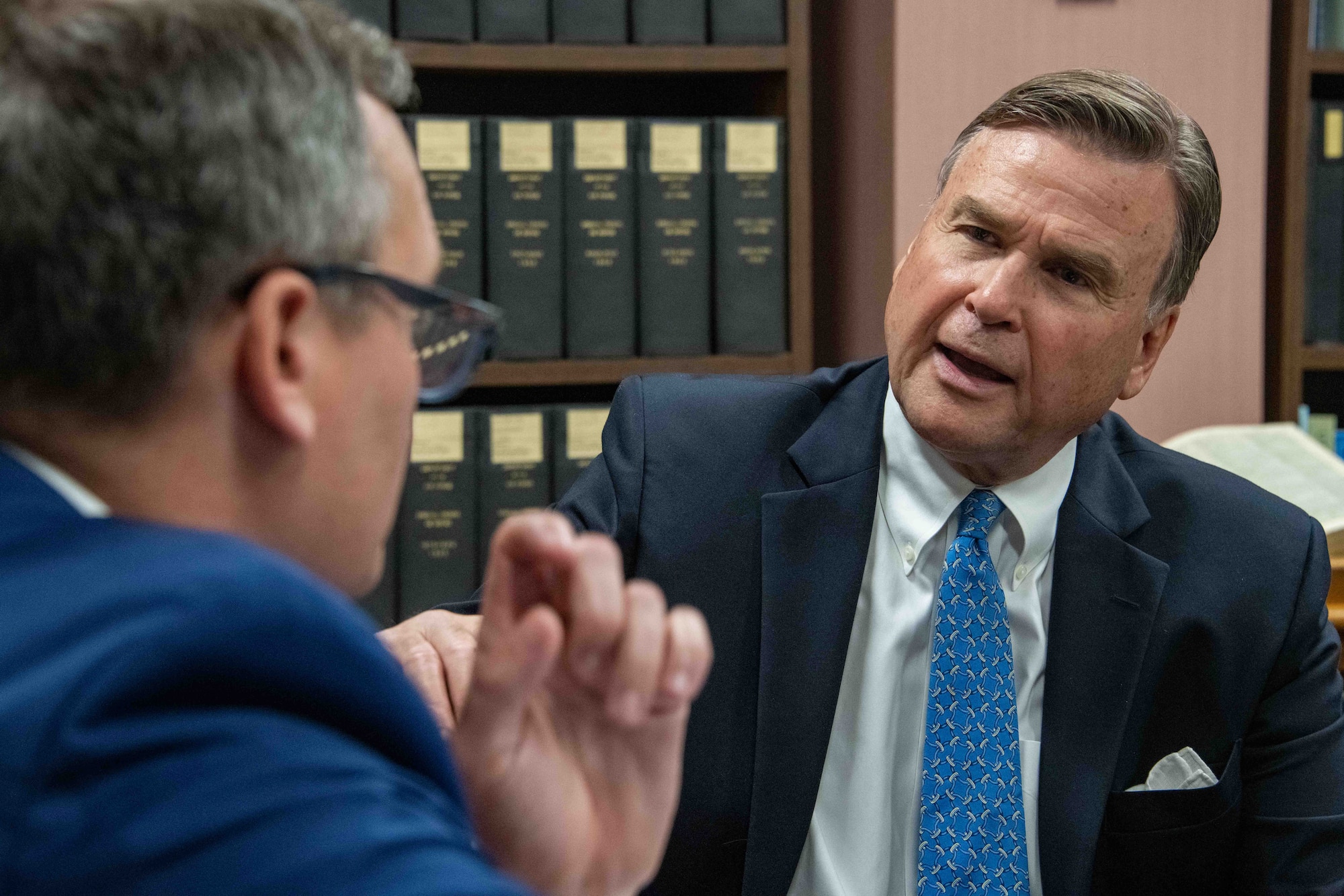 Ambassador (retired) W. Stuart Symington (right), answers questions from Patrick Charles, Air Force Historical Research Agency senior historian